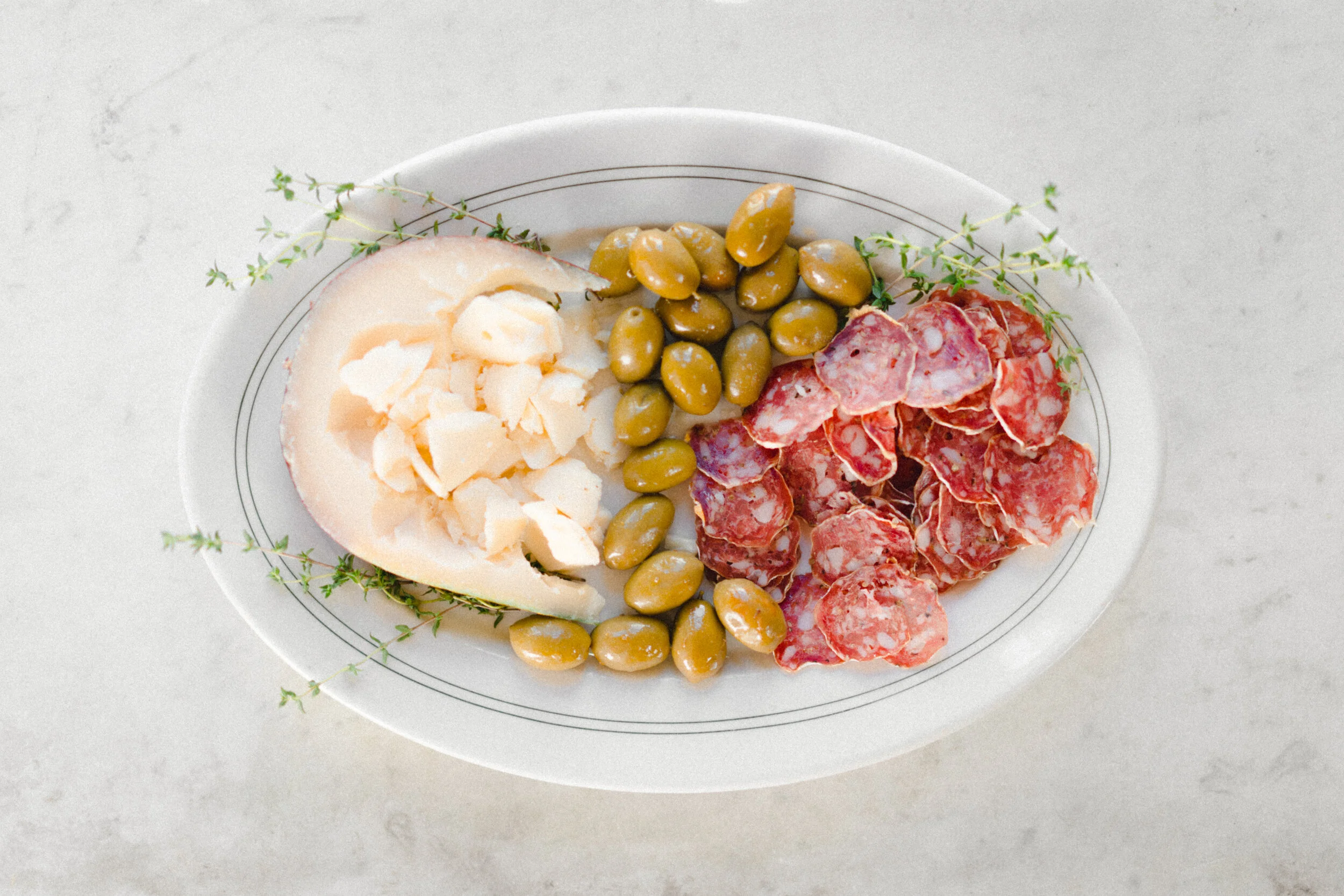 Photo of Platter with Sliced Salamini, Olives, and Cheese