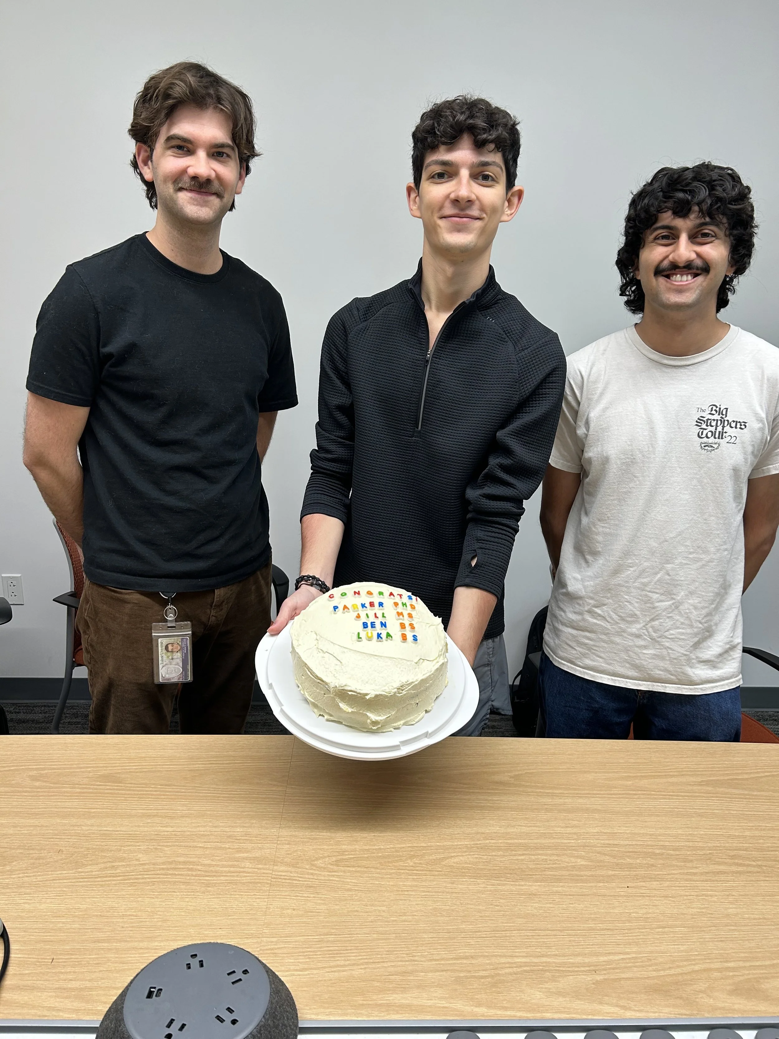  Celebrating Daniel lab 2026 graduates at the last lab meeting of the academic year. Congratulations to Parker Tirrell (PhD), Luka Colakovic (BS), Ben Pethe (BS) and not pictured Jill Flannery (MS). 