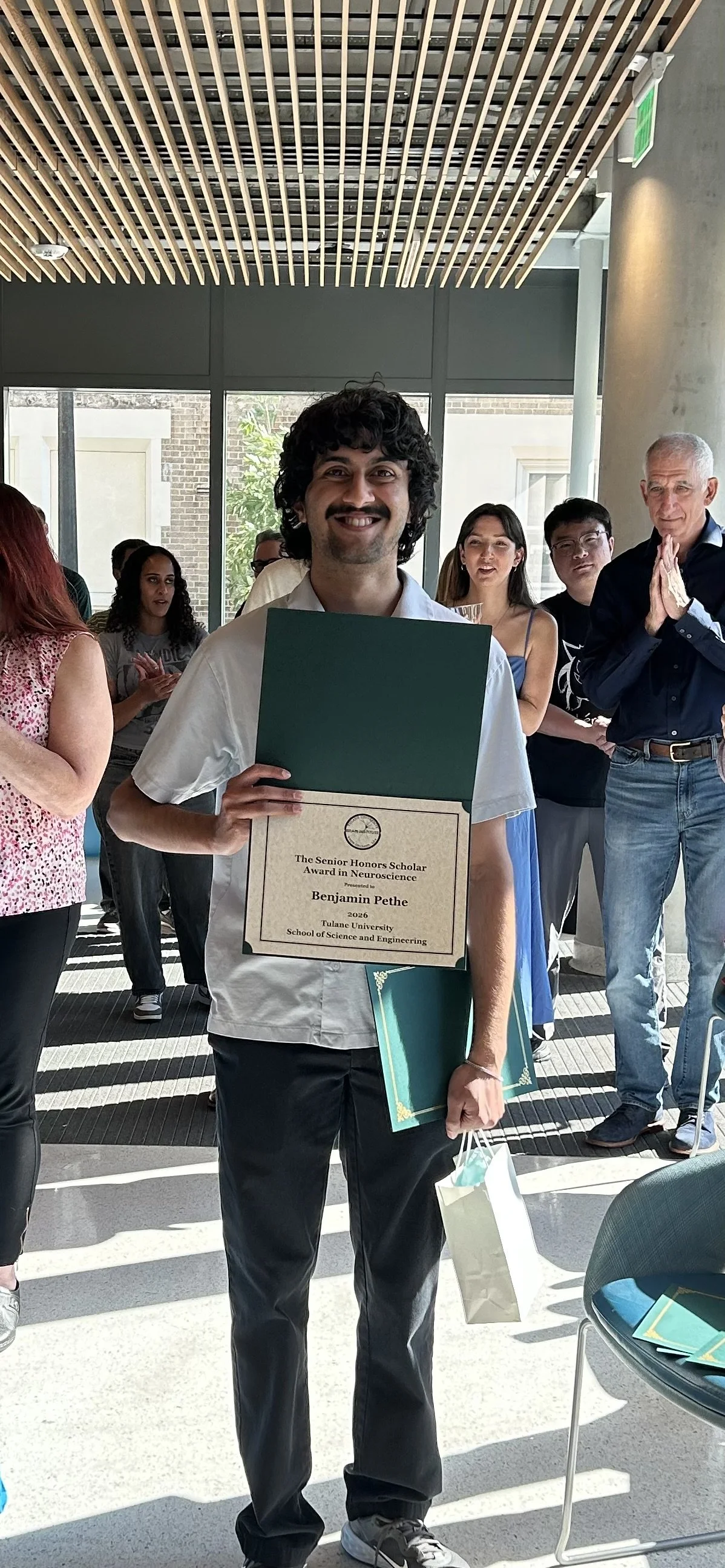  Daniel Lab undergraduate Ben Pethe receiving the 2026 Senior Scholar Award in Neuroscience. 