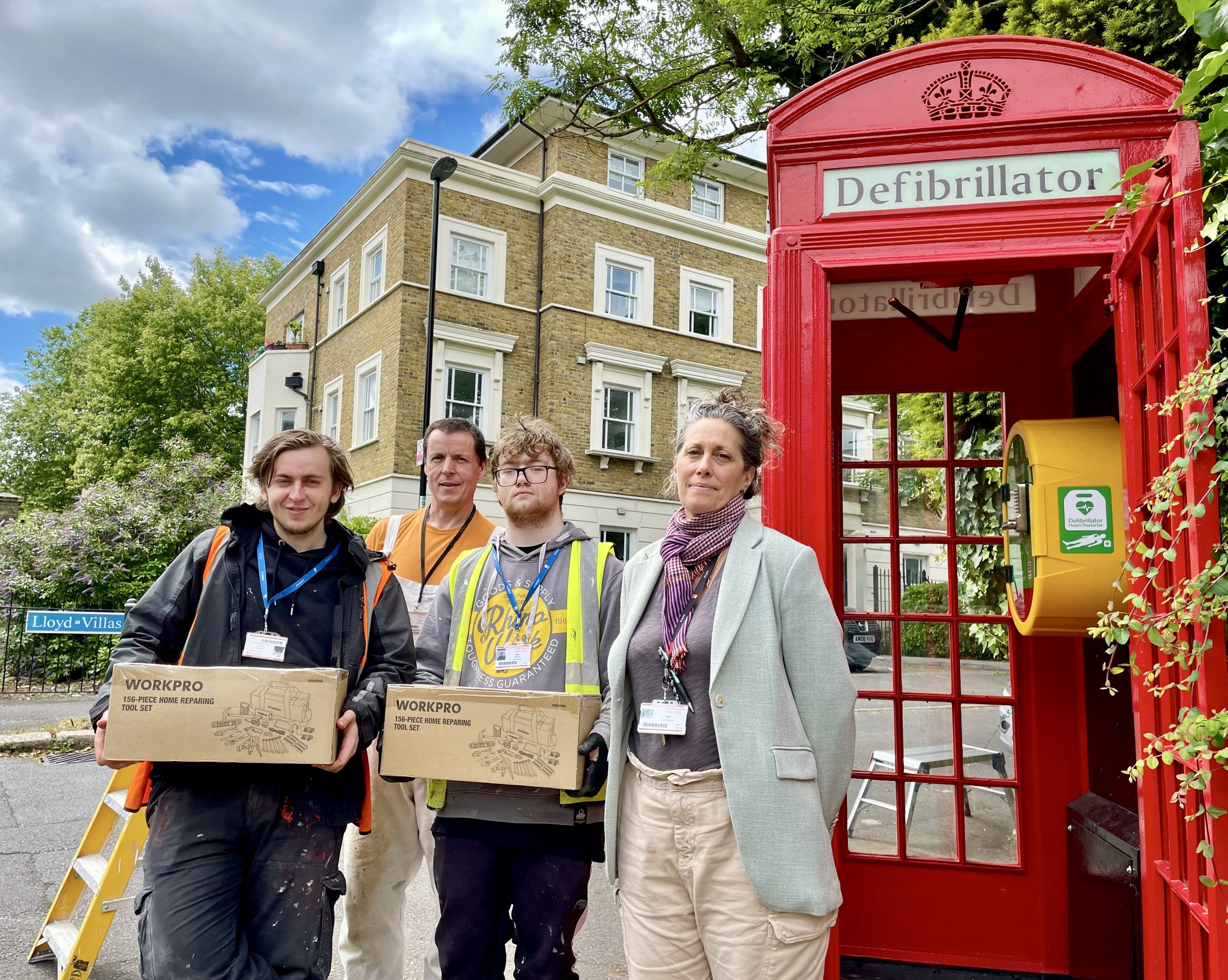 Kody, Declan, John & Kim_by fitted defib in telephone box_Friday 14th June.jpeg