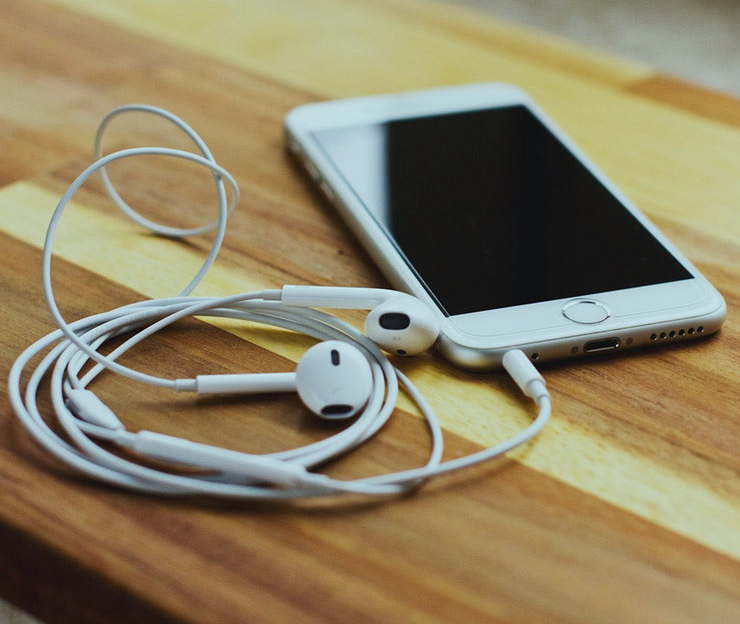 Earbuds with phone.png