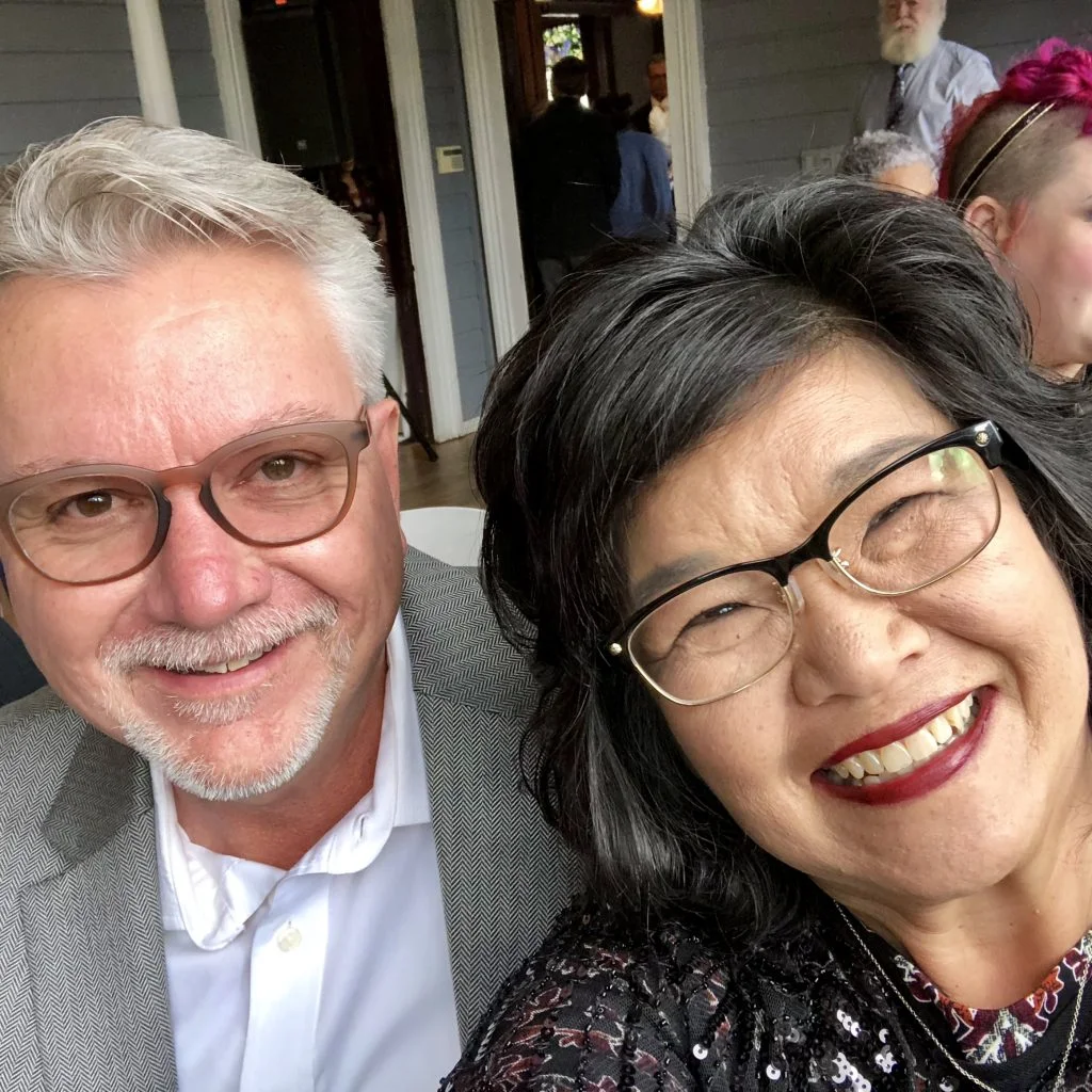 It’s a challenge to find a photo of me alone these days…and happily so! That’s Karen, my better half.