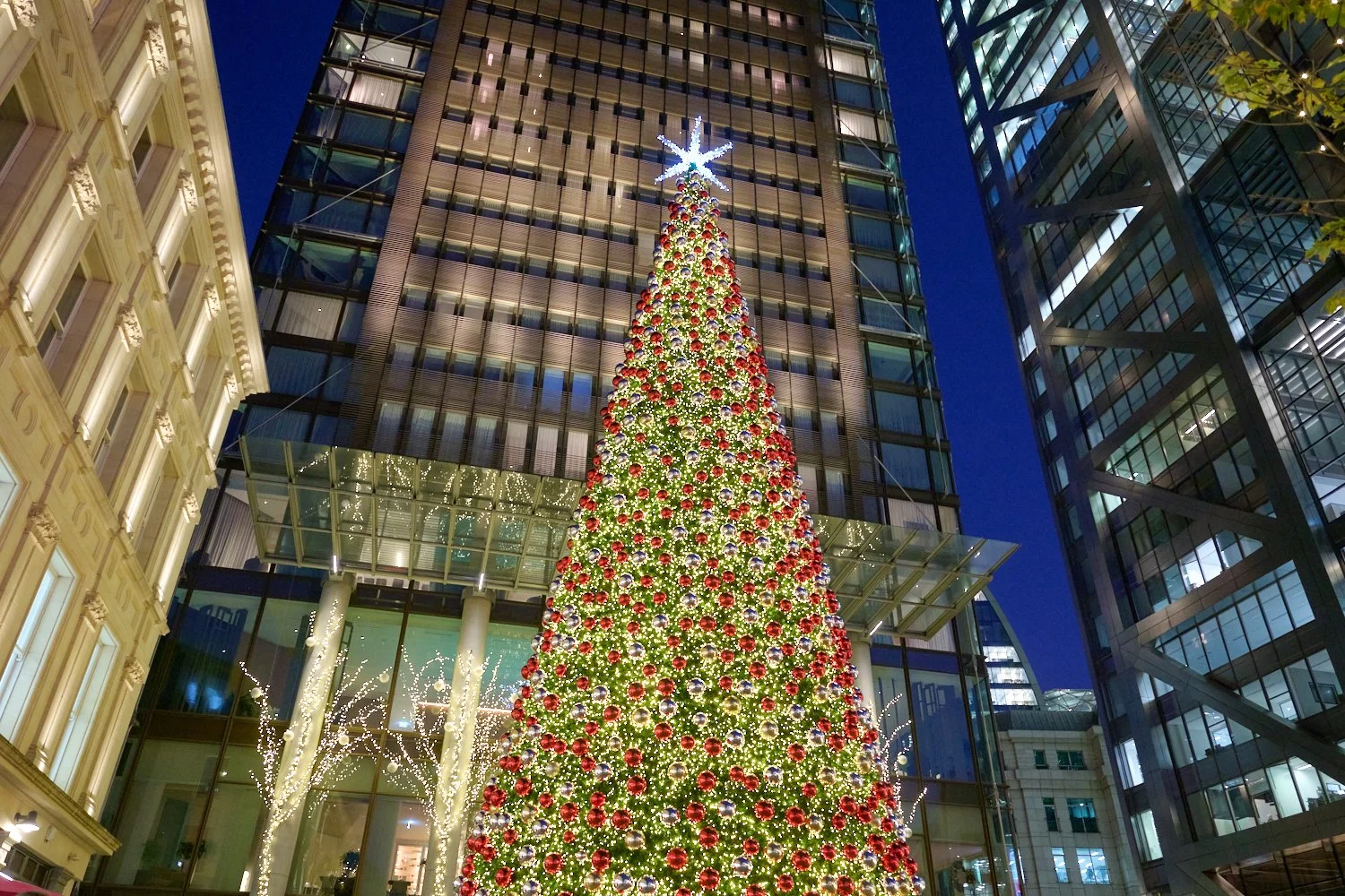 London’s tallest Christmas Tree lights up One Bishopsgate Plaza