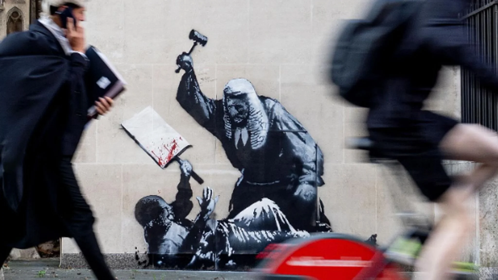 New Banksy artwork on Royal Courts of Justice concealed shortly after emerging
