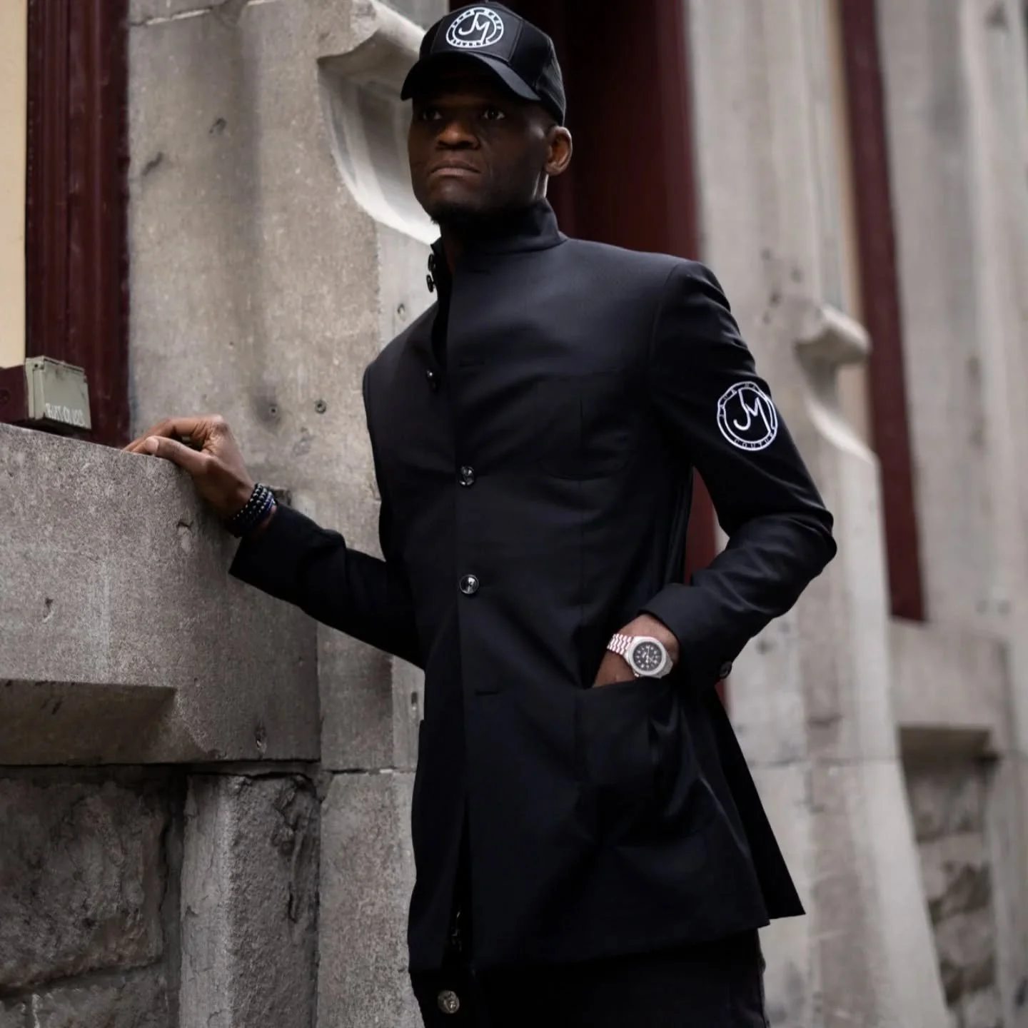 Black trucker, black banded collar jacket by JMC