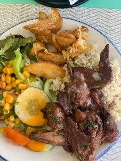 Salad , BBQ chicken, Parmesan Fries and Rice & Peas
