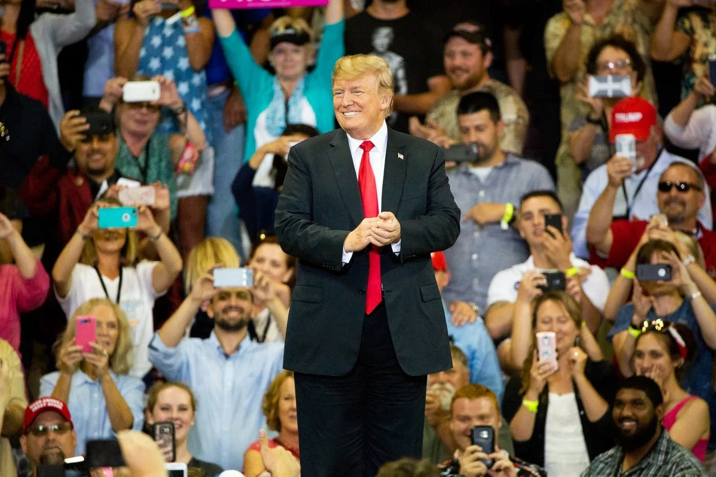 President Donald Trump smiles at the crowd inside of Amsoil Arena in Duluth, Minn. on Wednesday, June 20, 2018. Photo: Evan Frost | MPR News.