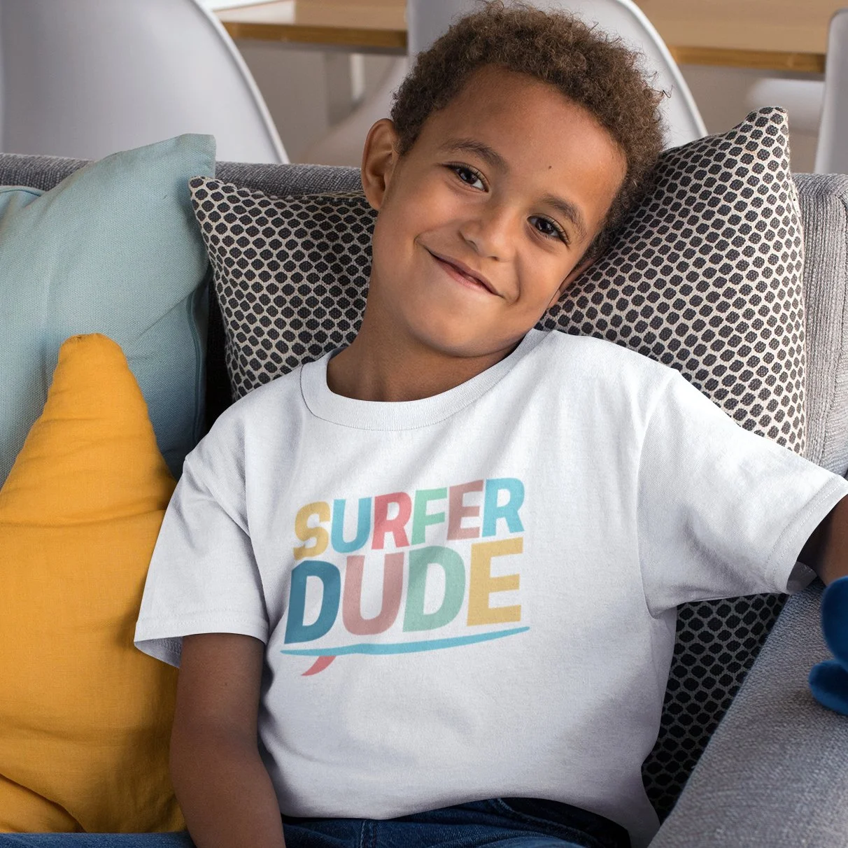 t-shirt-mockup-featuring-a-smiling-kid-sitting-on-a-couch-31639 copy.jpg