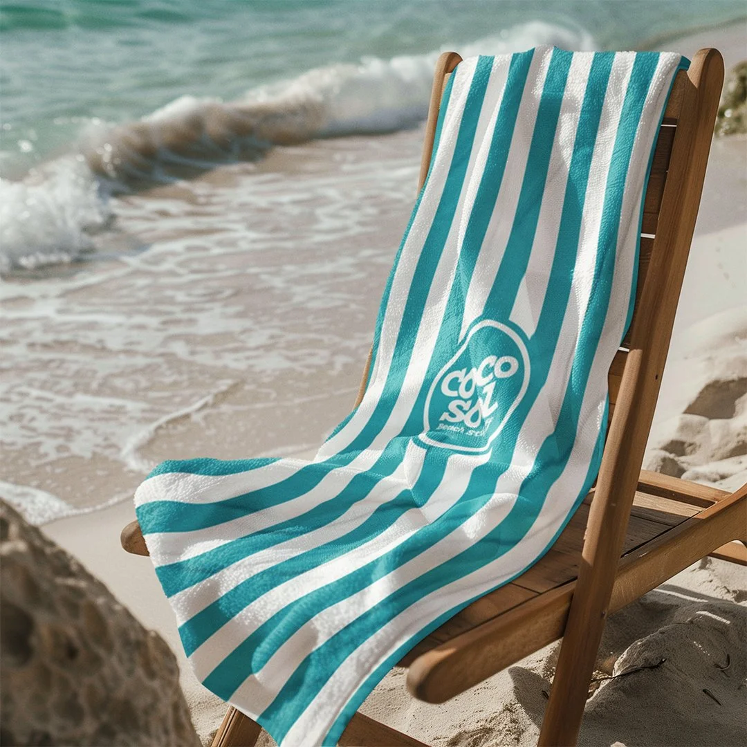 ai-generated-mockup-featuring-a-beach-towel-placed-on-a-wooden-chair-m40916 copy.jpg