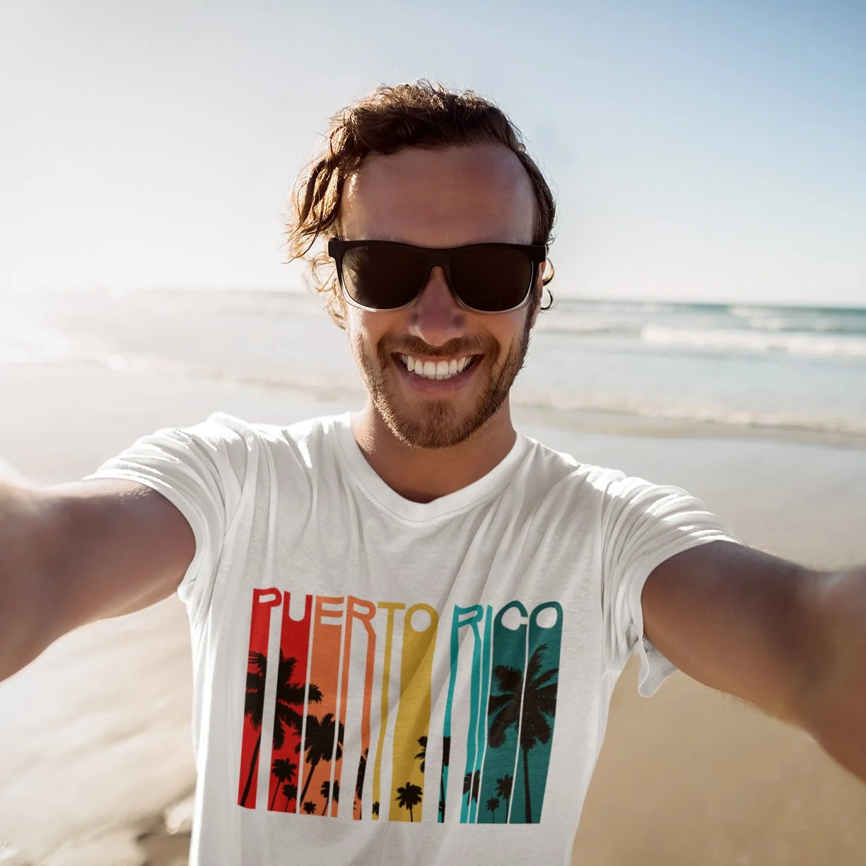 t-shirt-mockup-of-a-happy-man-taking-a-selfie-at-the-beach-46936-r-el2 copy.jpg