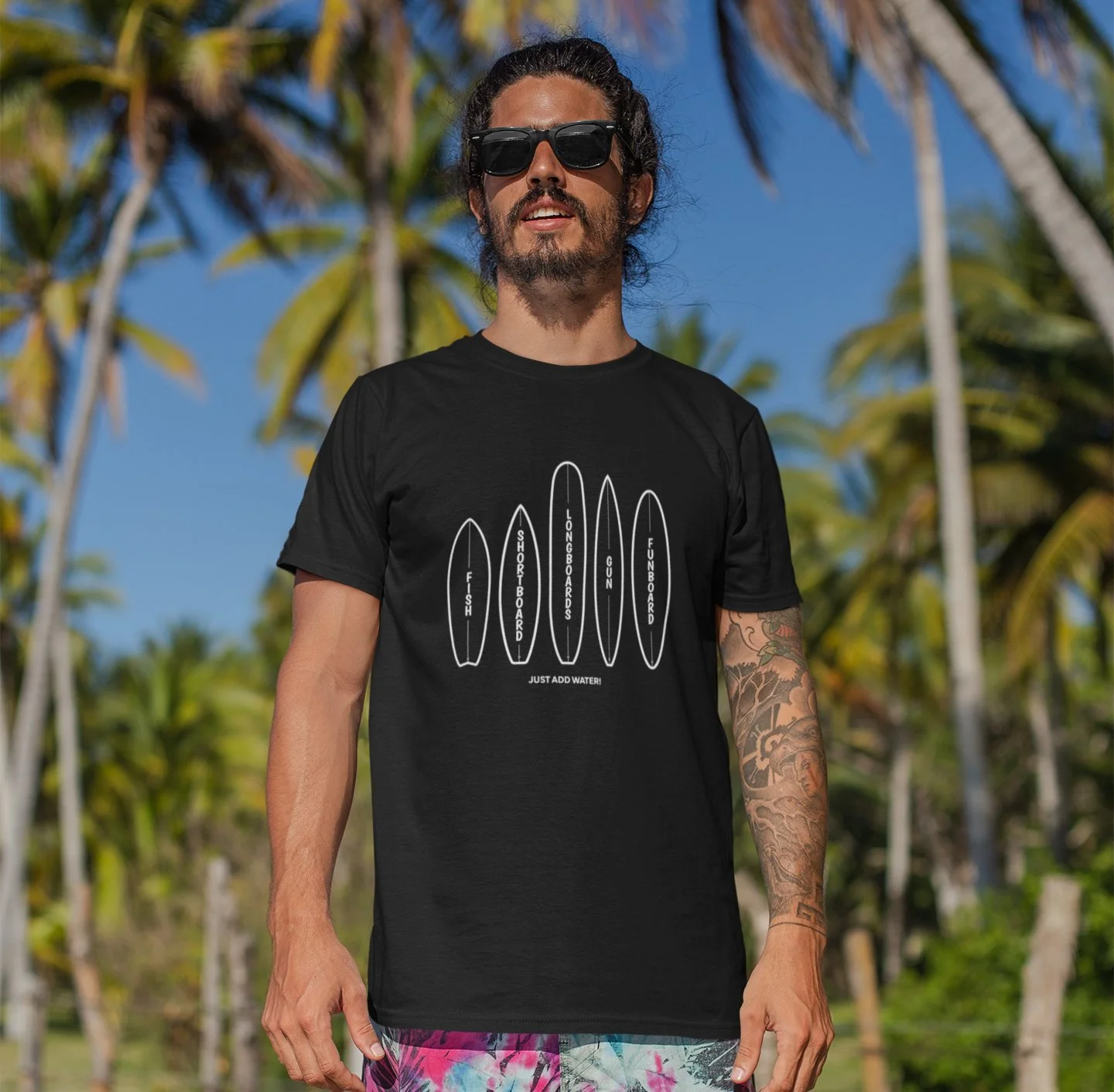 t-shirt-mockup-of-a-man-with-surfer-shorts-standing-at-the-beach-26755-2 copy.jpg