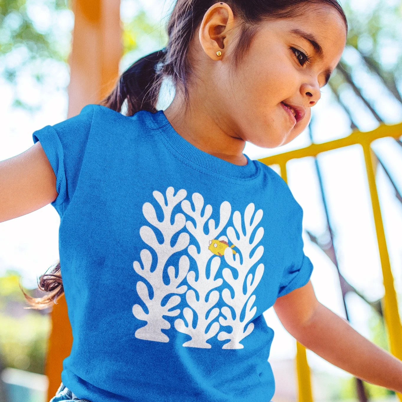 little-girl-playing-at-the-jungle-gym-t-shirt-mockup-a12107 copy.jpg