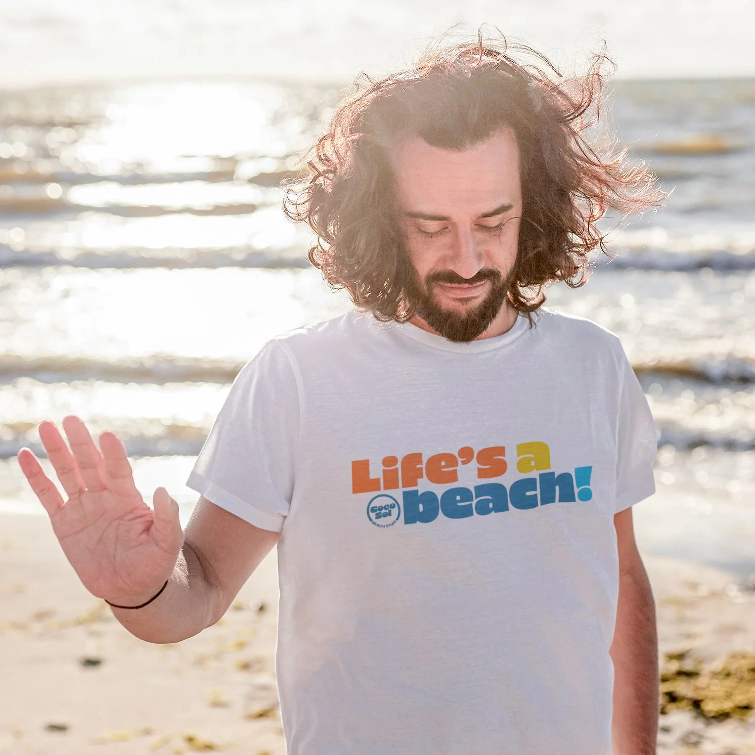 t-shirt-mockup-of-a-bearded-man-meditating-at-the-beach-41489-r-el2 (1) copy.jpg