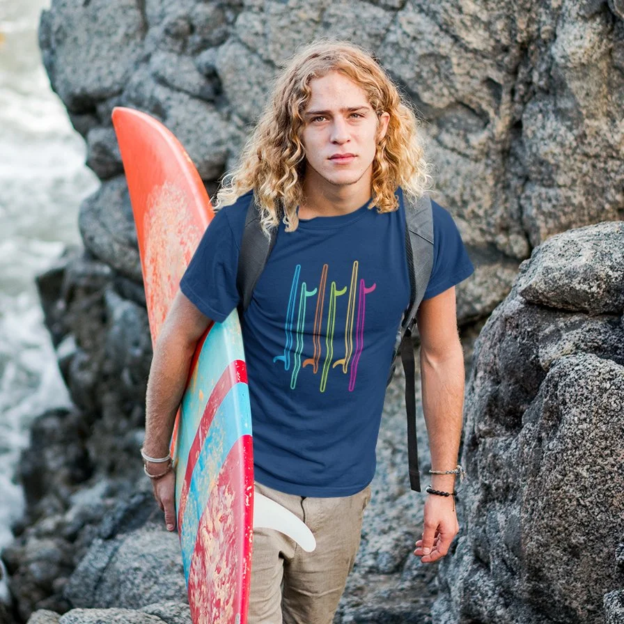 surfer-dude-wearing-a-t-shirt-mockup-on-the-rocks-a18801 copy.jpg