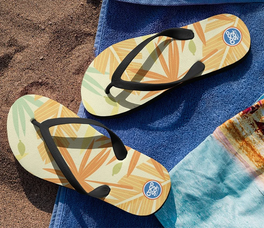 two-flip-flops-mockup-lying-over-a-towel-at-the-beach-a15438 copy.jpg