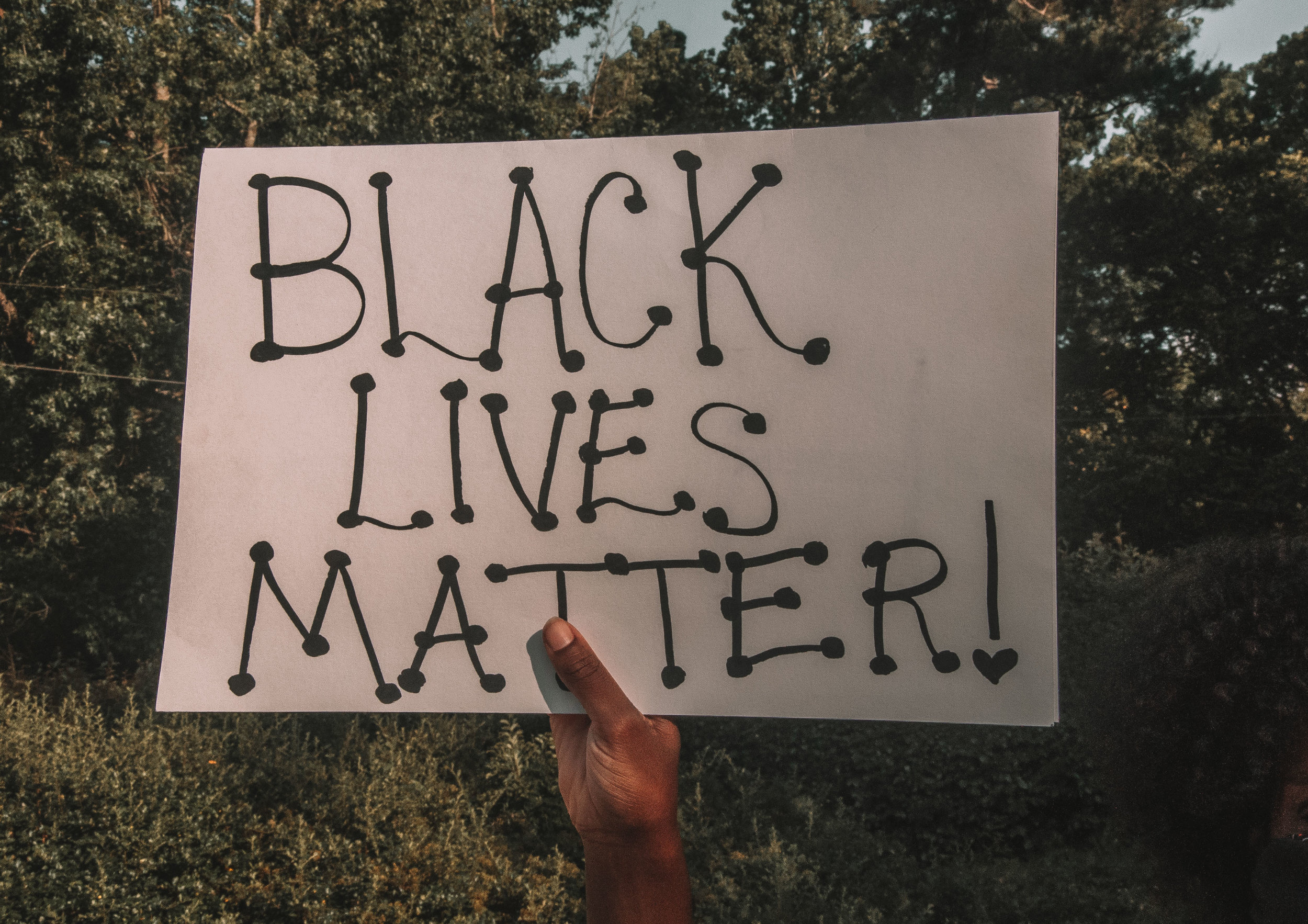 When talking about racism and protests, this expert recommends L.O.V.E.