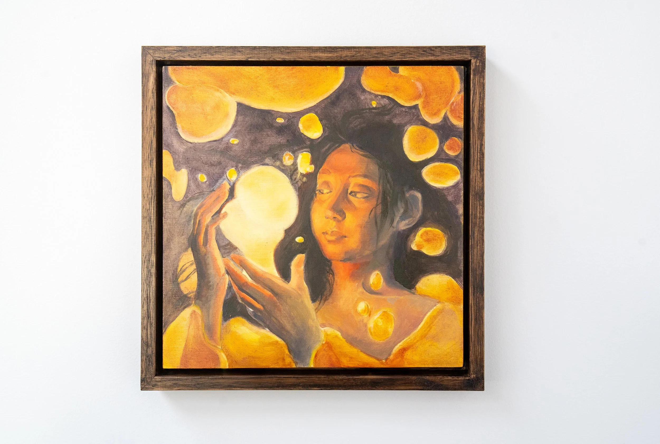 Embodiment (2025). Oil on panel, 23 x 23 x 3 cm. A figure enveloped in glowing orange and yellow lava light, painted in deep purples and warm gold. Exhibited at the New Zealand Academy of Fine Arts Academy Prize for Visual Art and the Taranaki Nation