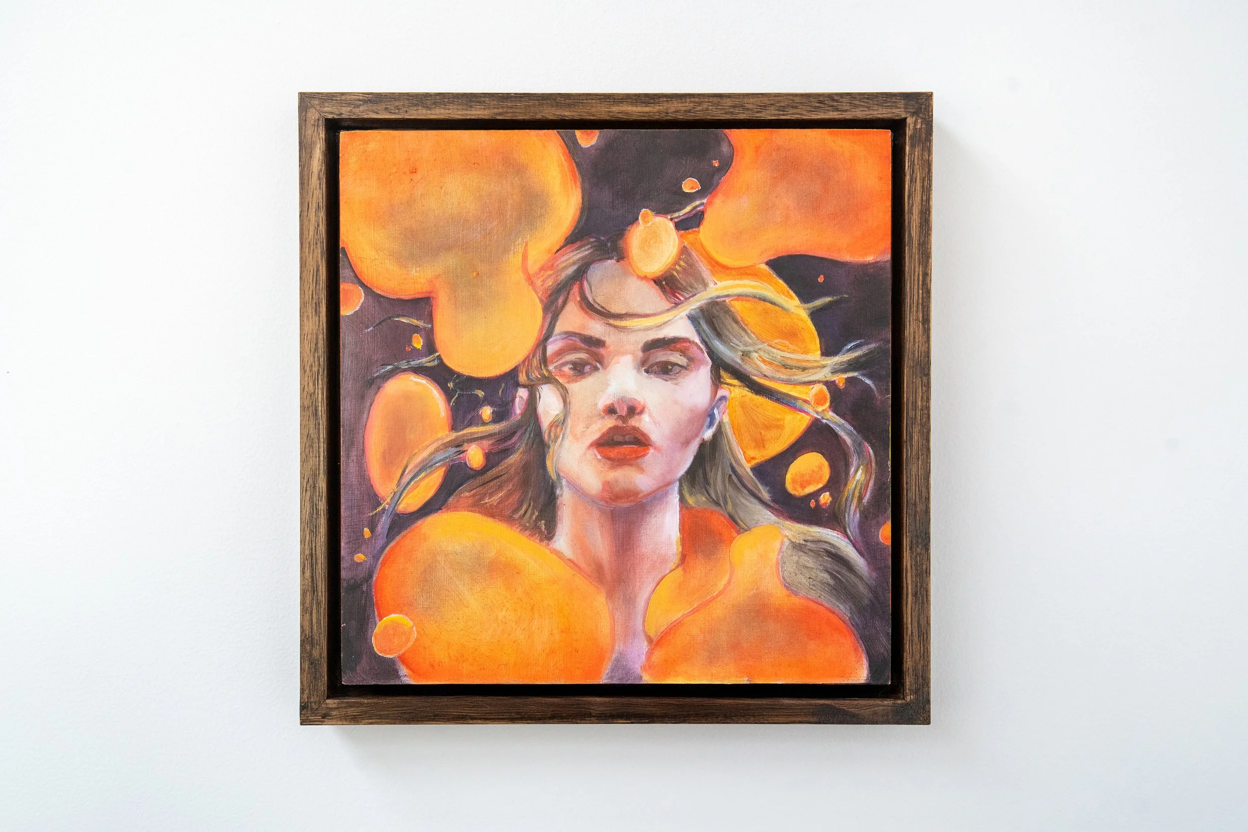 Renascence (2025). Oil on panel, 23 x 23 x 3 cm. A direct, confrontational portrait in bright orange, red, and muted pink — shown at the New Zealand Academy of Fine Arts Academy Prize for Visual Art, 2025. Available. Nicole Keane, Aotearoa New Zealan