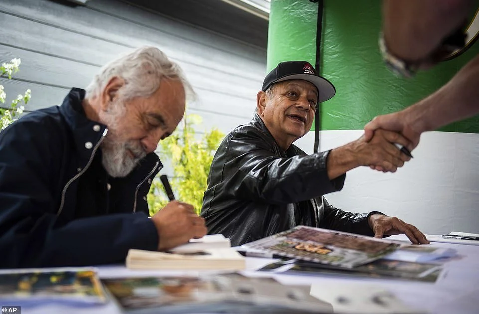 Tommy Chong and Richard 'Cheech' Marin shake hands and sign autographs outside of Commencement Bay Cannabis in Tacoma, Washington. The once counter-culture celebration that was all about getting stoned now is so mainstream Corporate America is start…