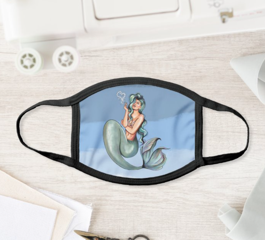 Mermaid one on table dif background.PNG