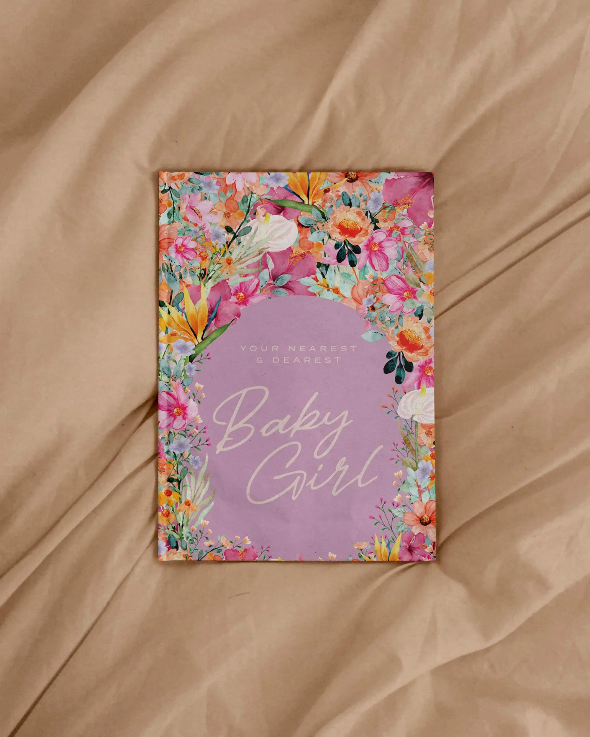 Greeting card with floral border and purple background reading 'Your Nearest & Dearest Baby Girl'.