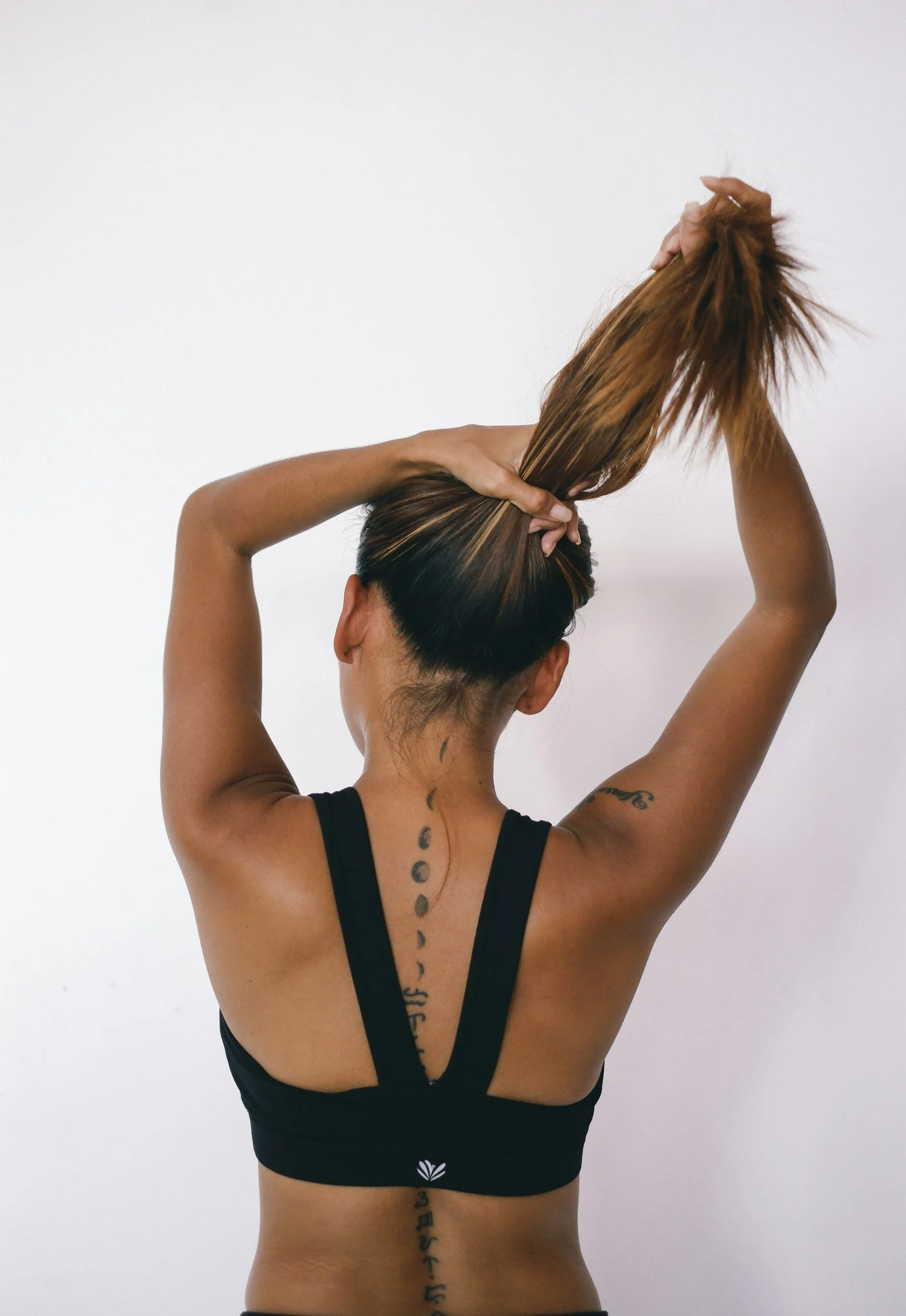 athletic woman with dark tan