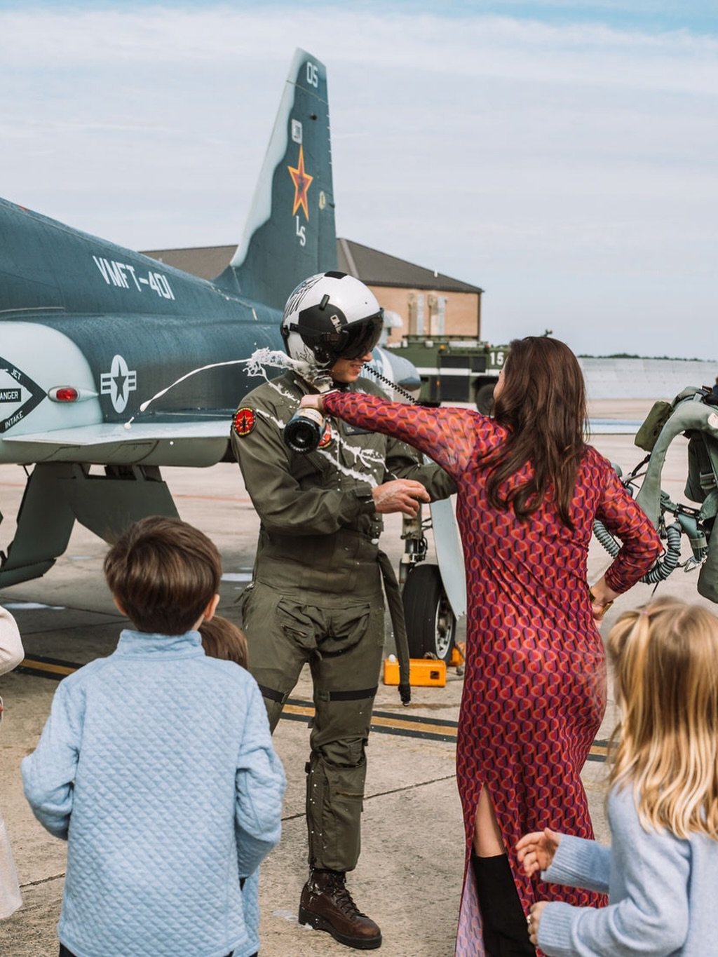 Last flight and retirement with champagne showers, but on the friends and family this time 🍾🇺🇸✈️ What an incredible chapter to close + celebrate 20 years of service to his country and to the Marine Corps. Congratulations &ldquo;Woogie&rdquo; and f