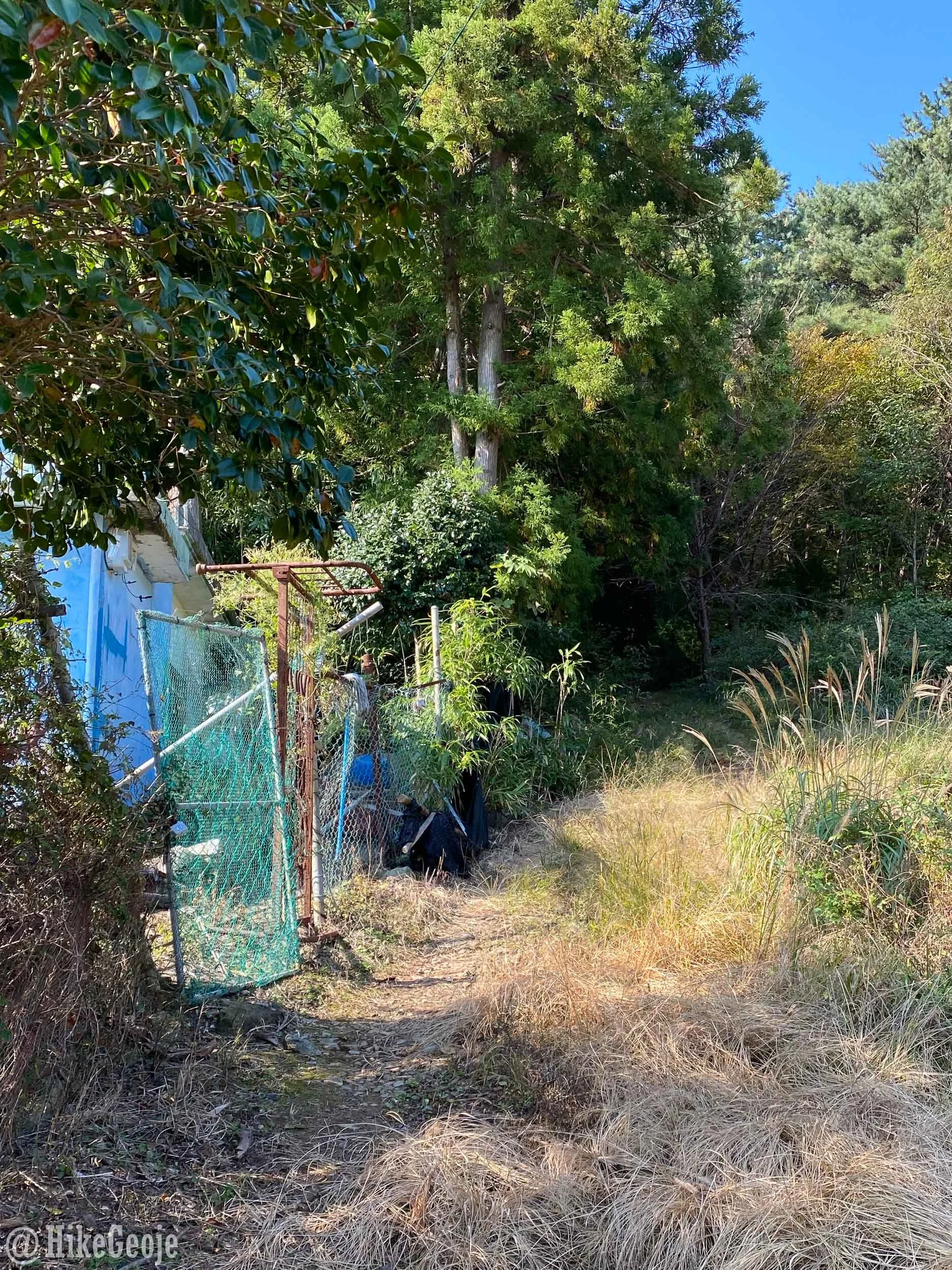 The end of the fenced-in area.