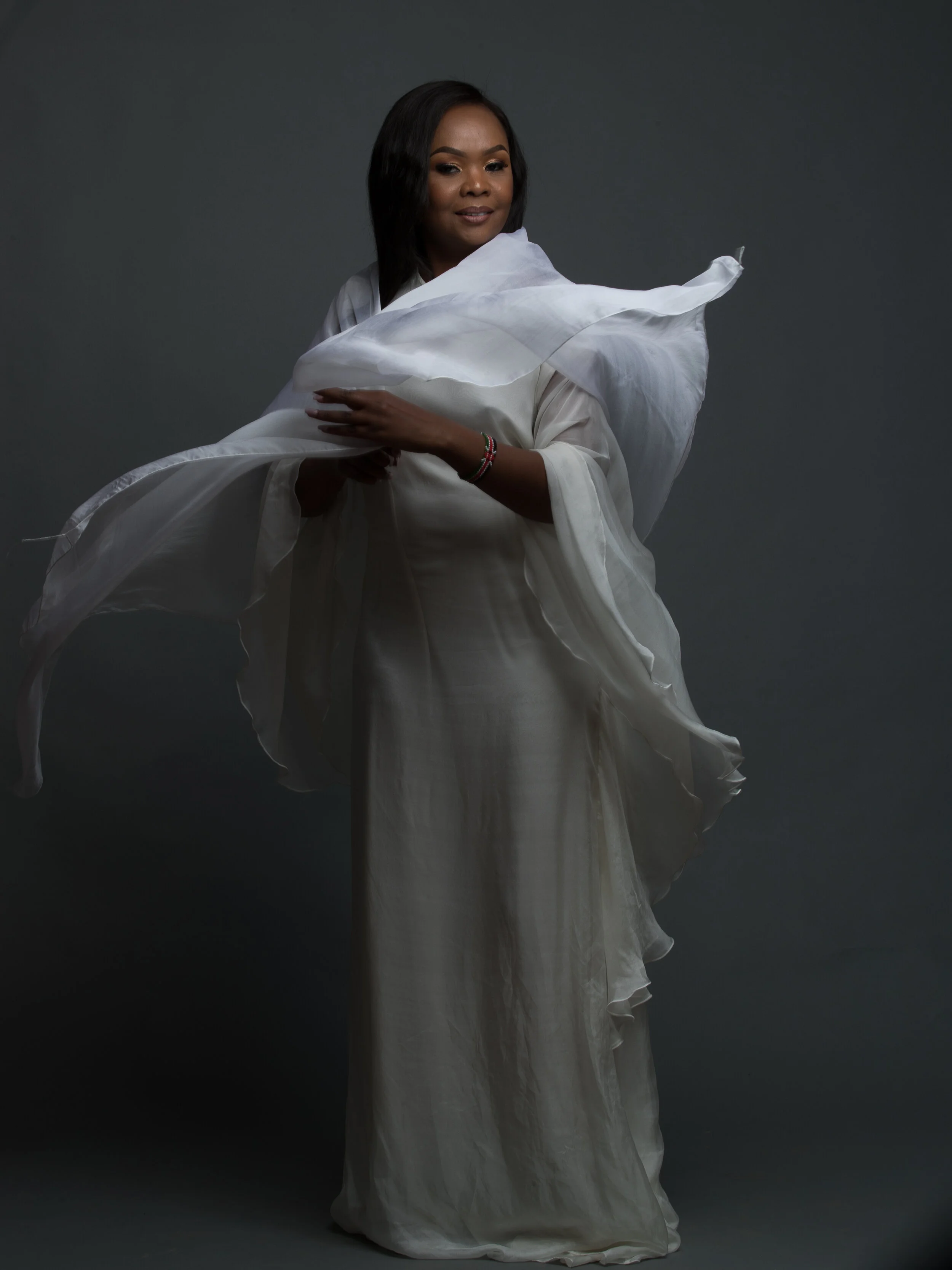 Ivory silk kaftan dress, £450 Silk chiffon Silk satin lining Dry clean only