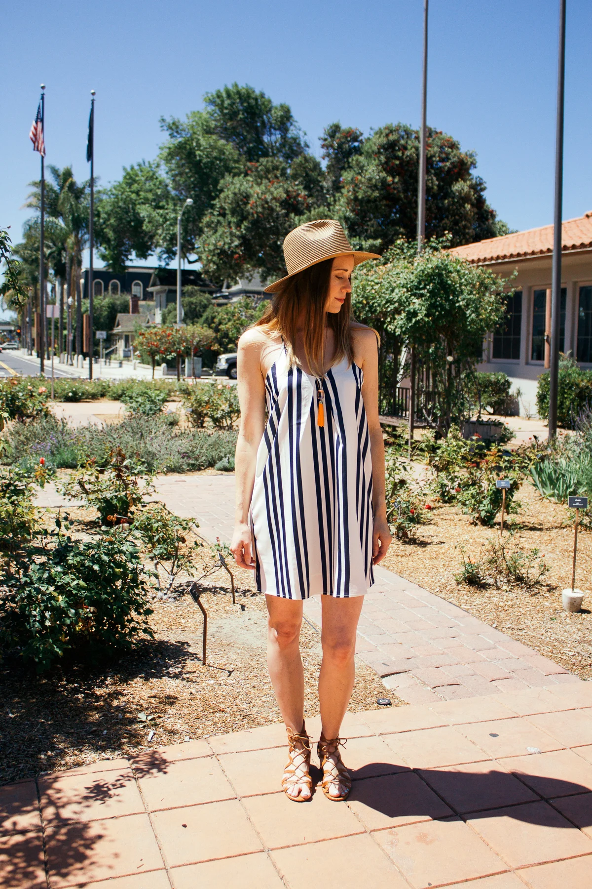 Bishop + Young striped dress, Stacked, navy and white dress, tassel necklace, JCrew necklace, Madewell straw hat, straw hat, summer style, Corso Como sandals, lace up sandals,