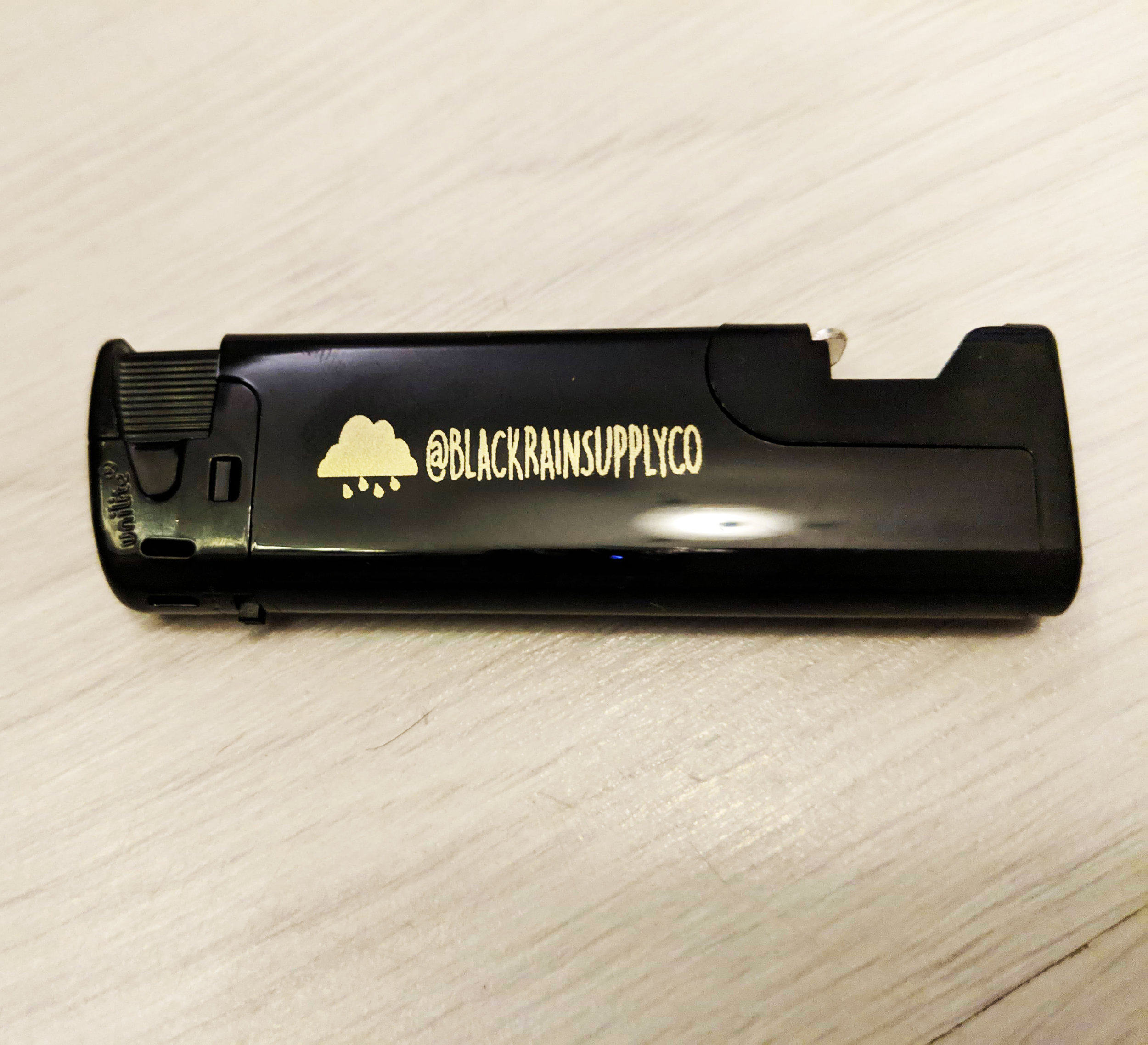 Black Rain Lighter/Bottle Opener