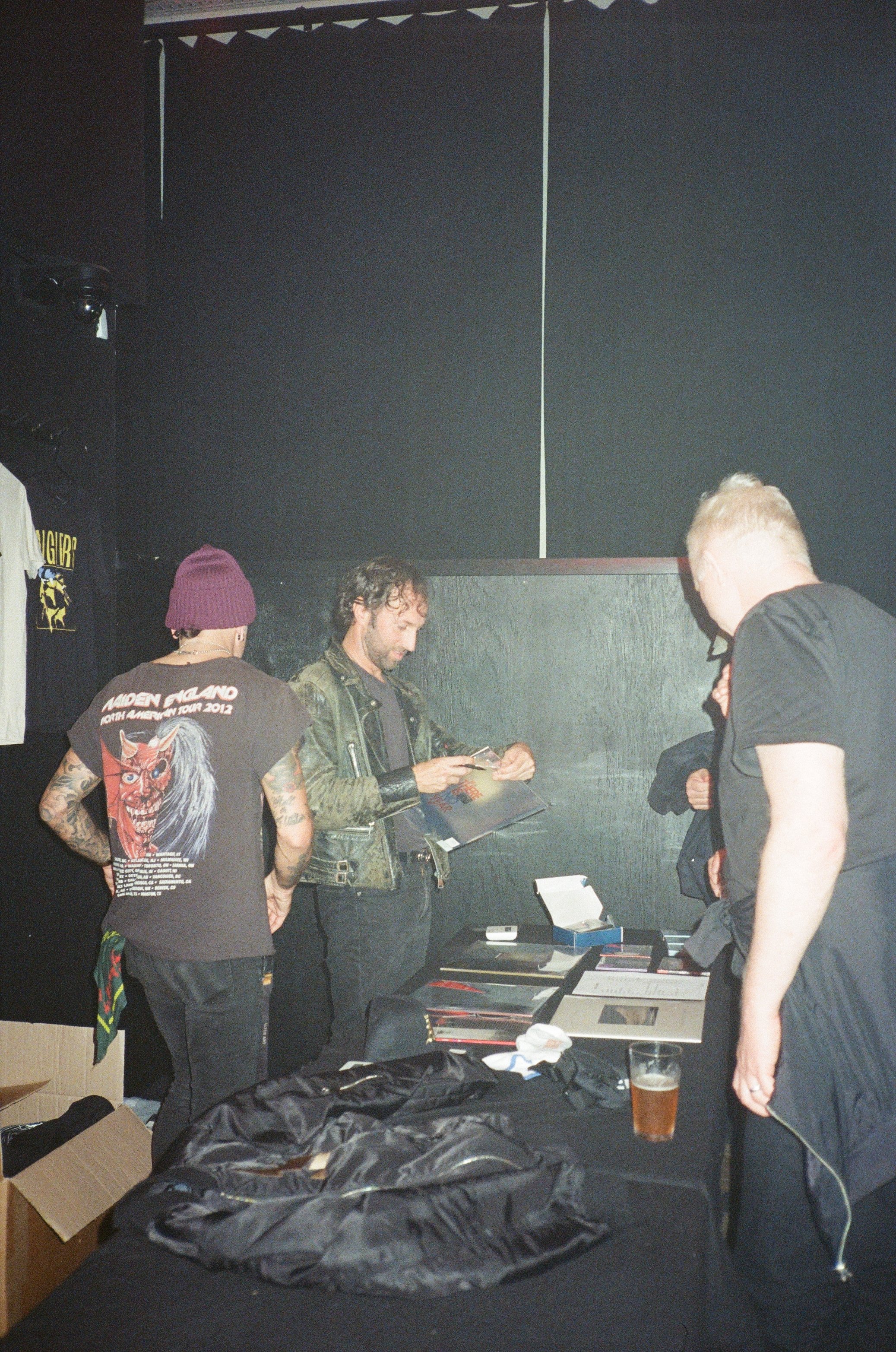 Tristan and Lee at merch stand, Slaktkyrkan