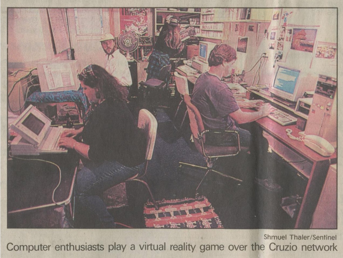 “Early geeks” playing a Multi User Dungeons and Dragons game. Chris Neklason, one of the founders of Cruzio and still co-CEO, is on the right.