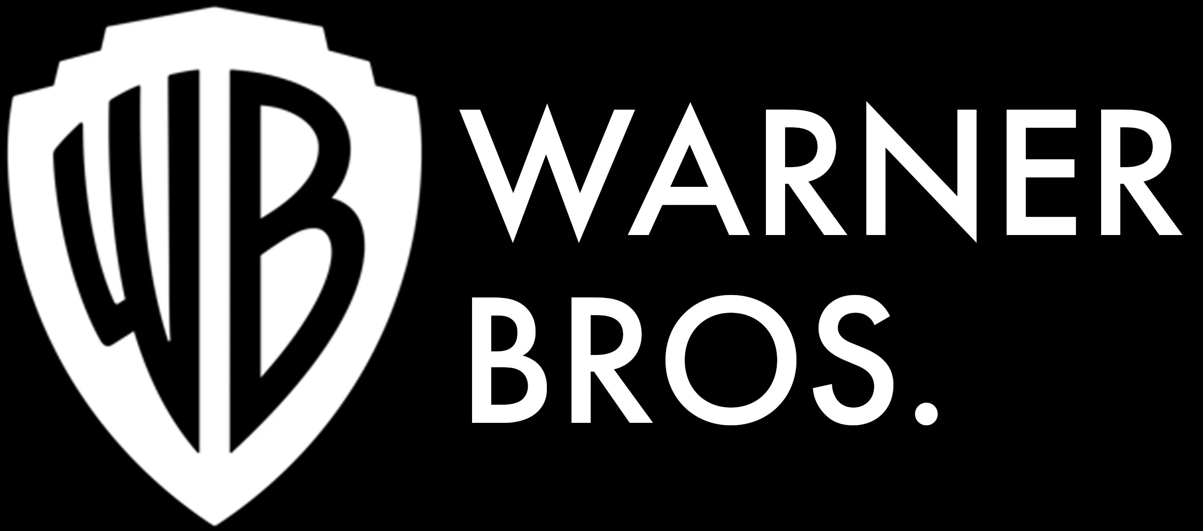 Black and white Warner Bros. logo with stylized shield and the letters WB in the center.