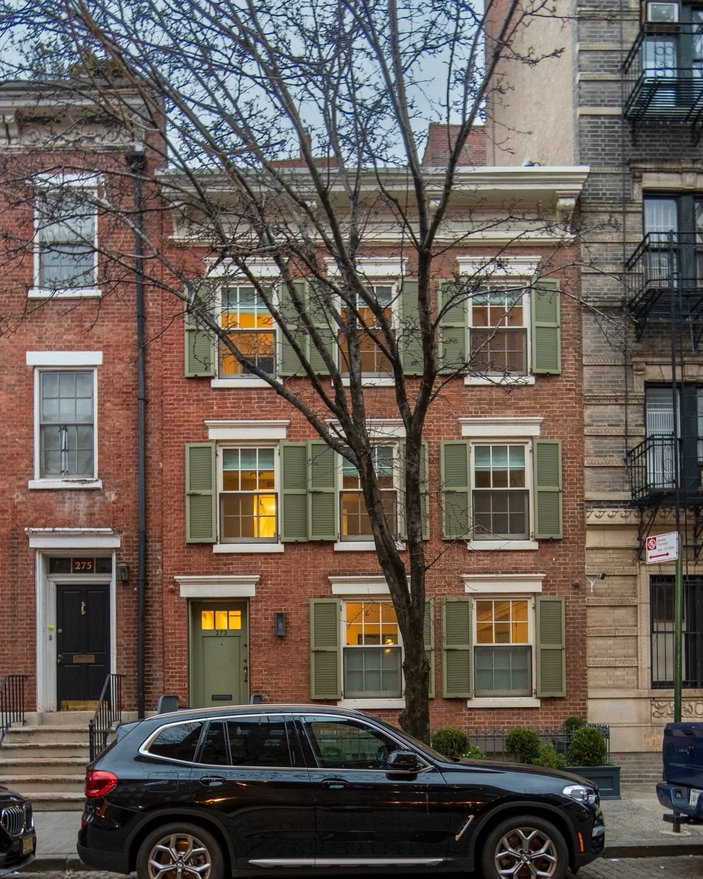 273 West 12th Street was built in 1831 as a two-story home. However, in the 1870s, it was modified when a third story was added. Many buildings like this that were built in the 1820s and 30s would have been two stories with a little gambrel window or