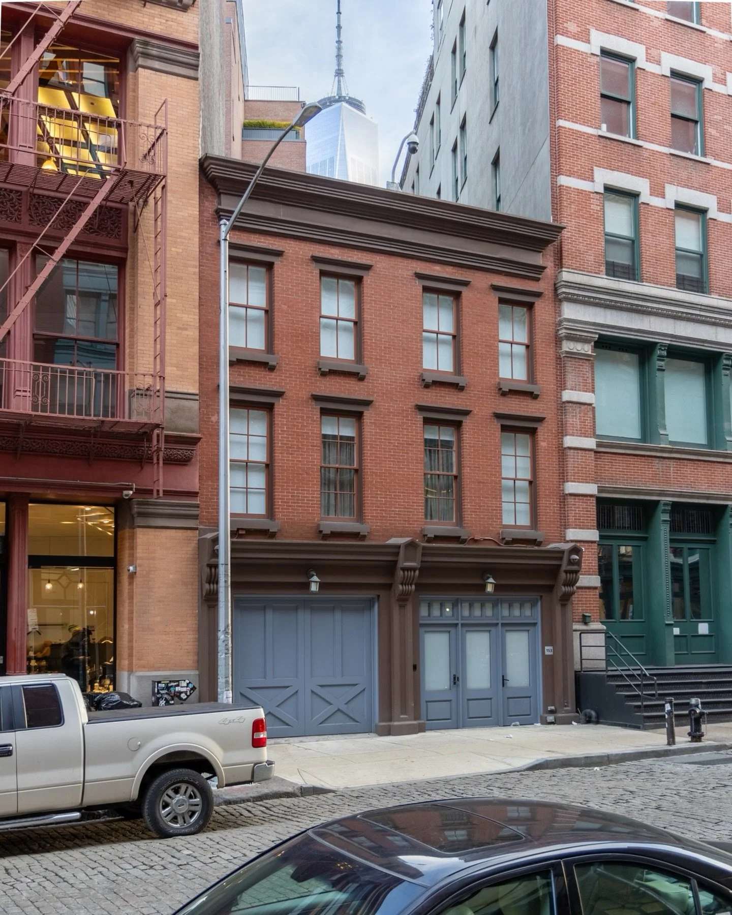 I feel like this photo sums up the evolution of New York architecture rather nicely. 153 Franklin Street was built in 1853 and originally served as a firehouse for Hose Company 54, which earned the name Eureka, which is fun. They were joined by Hook 