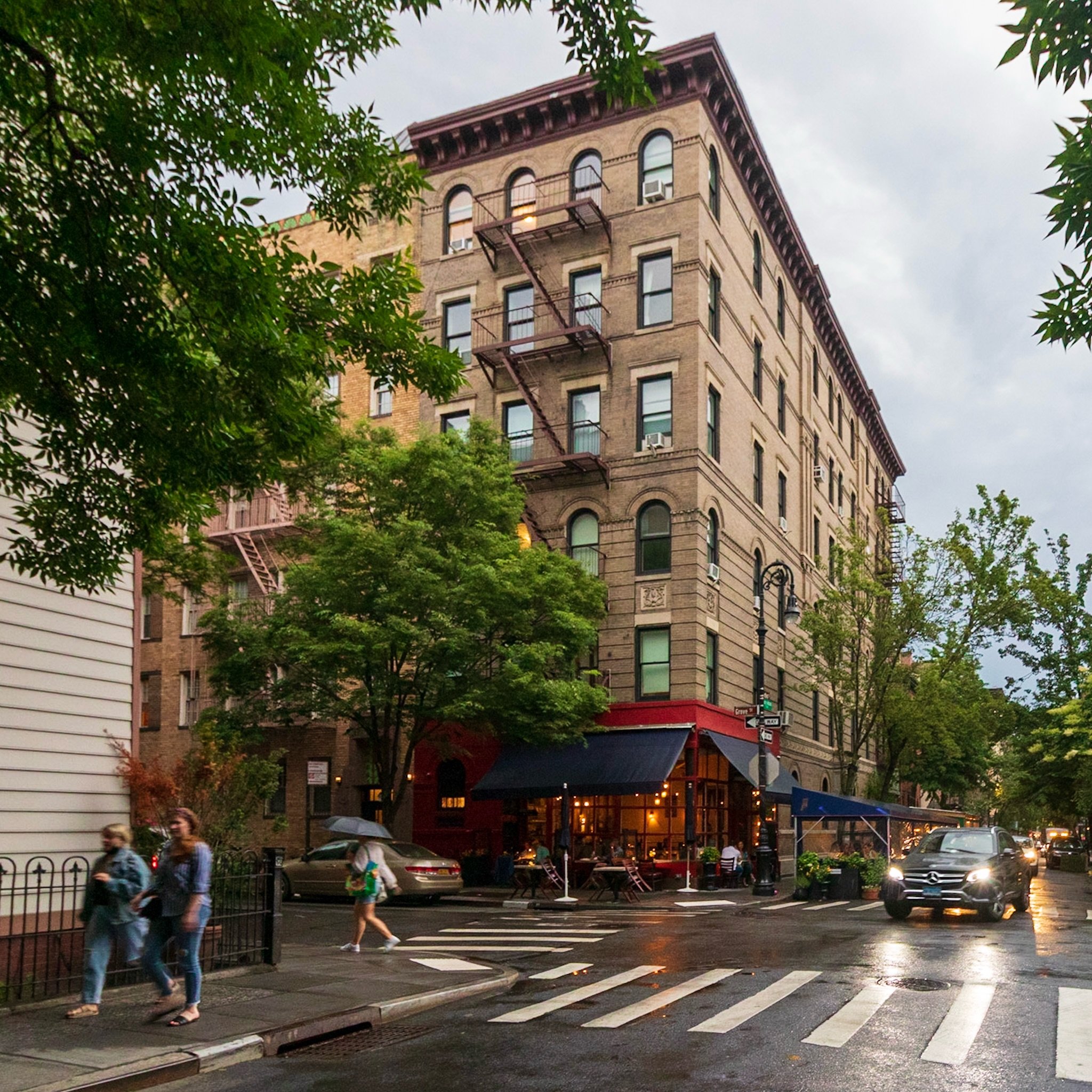 The village is full of lines these days. However, there is one corner which has always had a line of people taking photos.  Located at the corner of Bedford and Grove Street in the West Village, 90 Bedford Street, also known as the Friends building, 