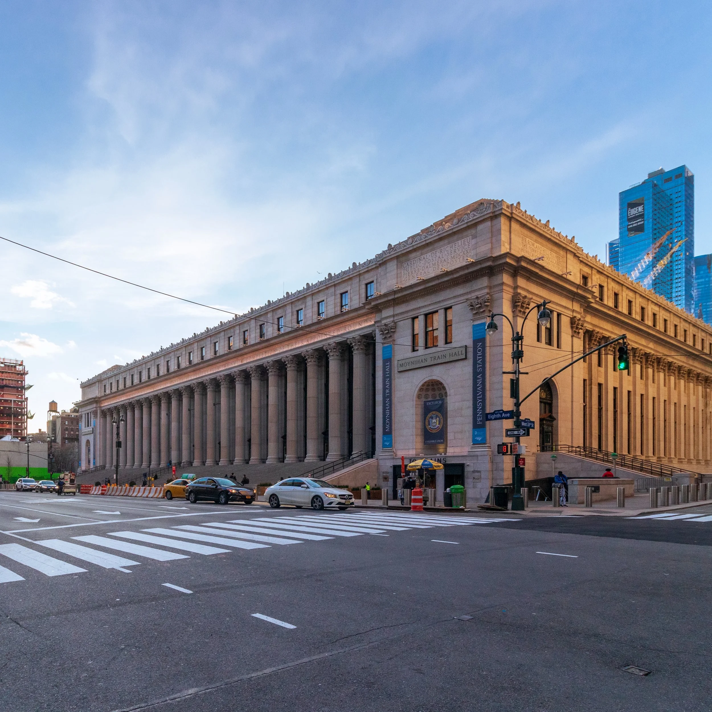 The building that houses the Moynihan train hall was built in 1913 by McKim, Mead, and White as the General Post Office, three years after they completed the original Pennsylvania Station across 8th Avenue. At the time, most mail in the country was d