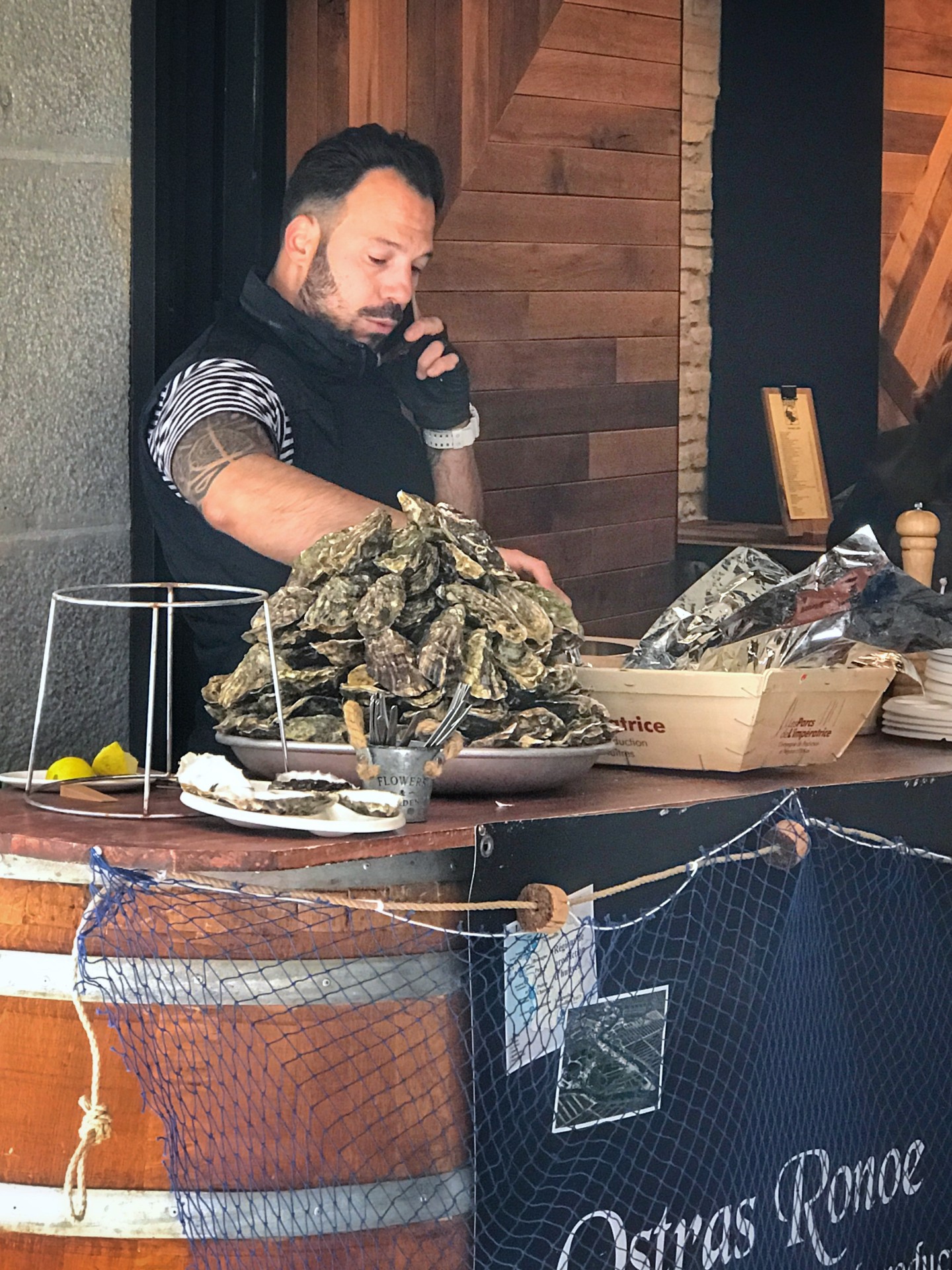 Camino-tapas-oysters-bartender.jpg