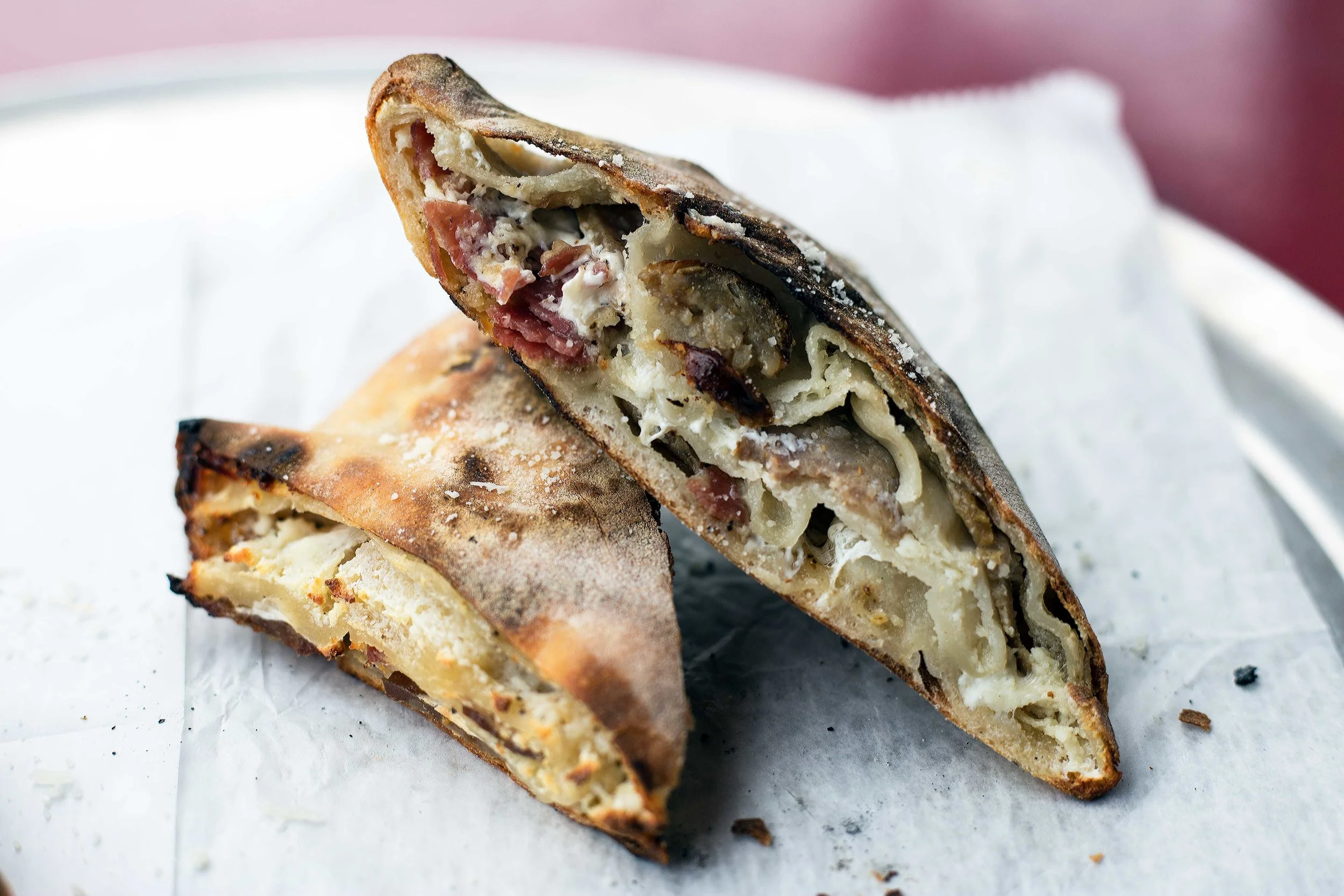 Scaccia—Sicilian rolled pizza.