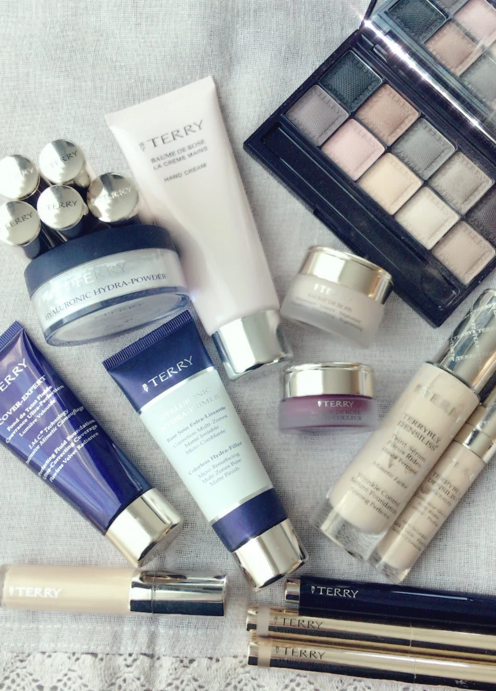 My collection of By Terry products. Lipgloss in bottom left corner being my very first, bought in Paris at Sephora on Champs Elysees, on my very first trip to Europe.