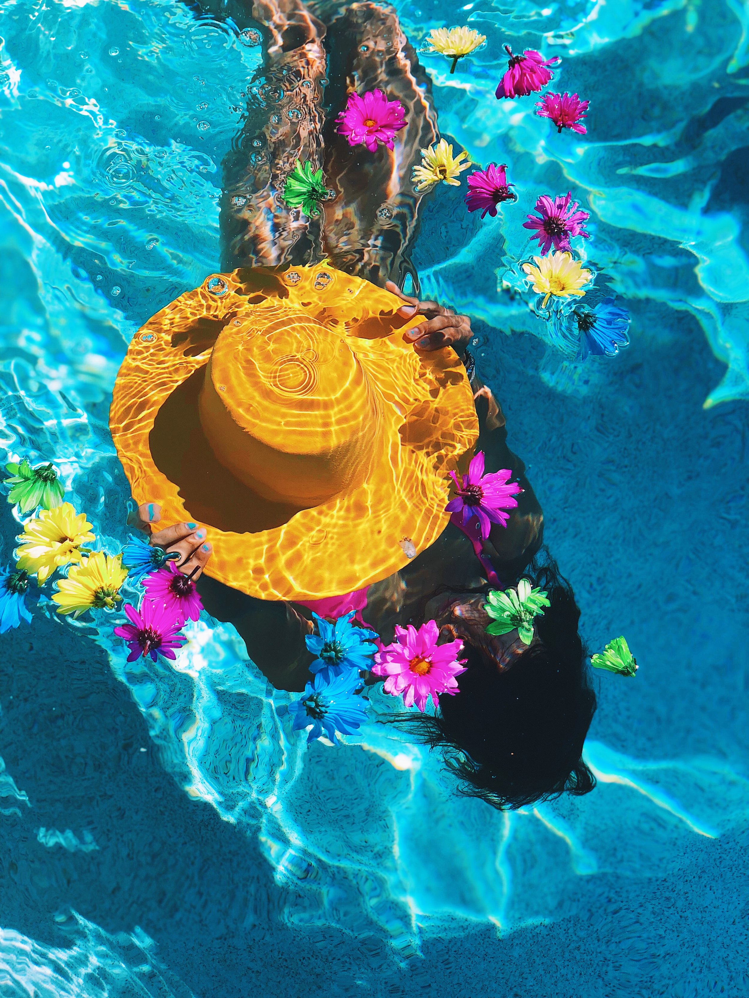 girl-underwater-in-palm-springs-with-a-water-resistant-superbloom-orange-hat.JPG