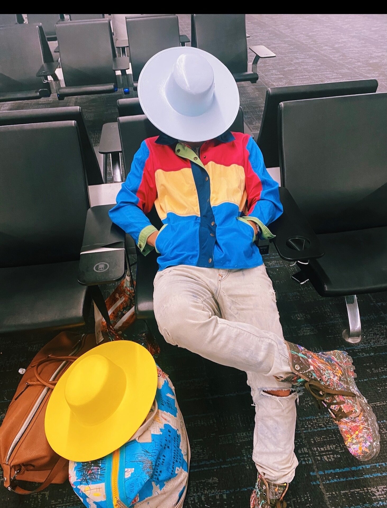 mysterious-white-airport-hat-superbloom-man-traveling-palm-springs-new-york-city.JPG