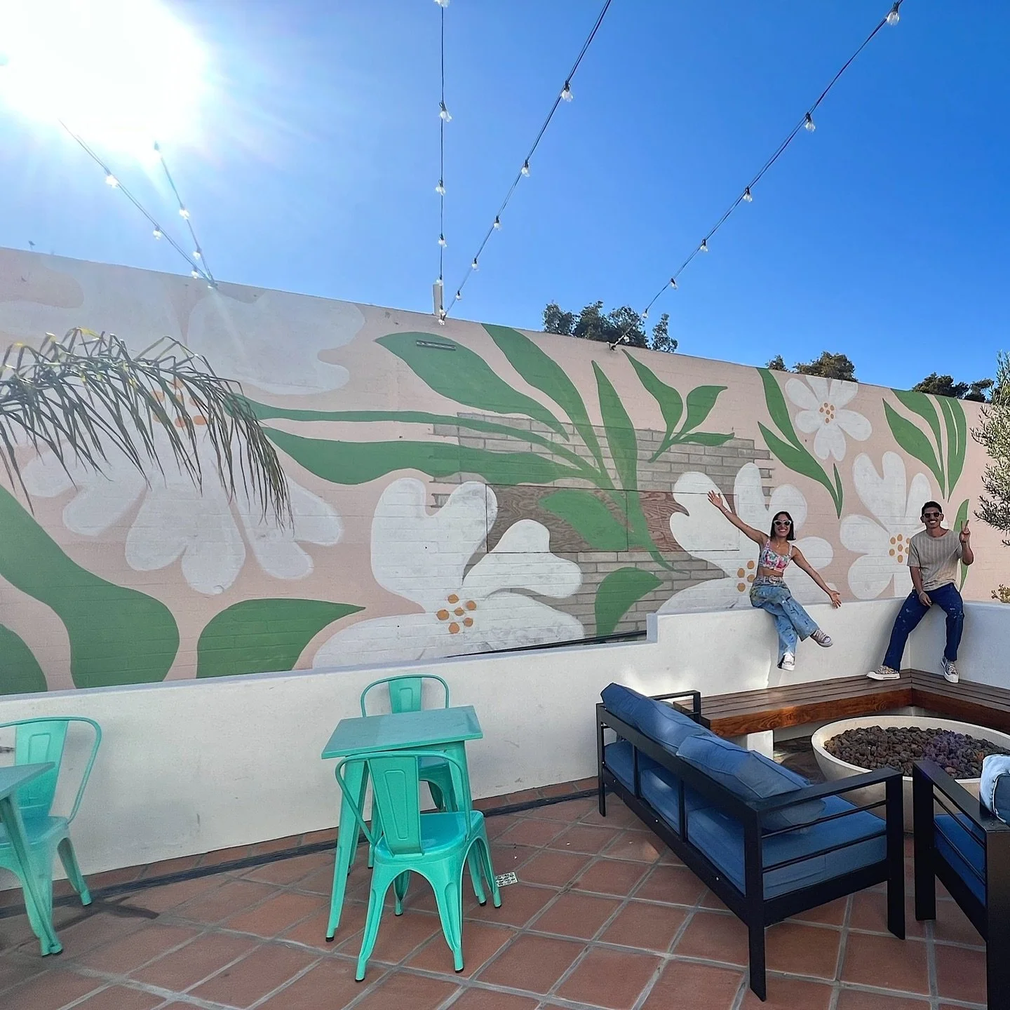 We just finished a 31ft x 12ft mural for our friends at @cocina_jaguar @jaguarmoonbar 🌼 A burst of Ventura wildflowers now stretch across the patio wall, painted to feel a bit weathered like they’ve always been part of the building and the nat