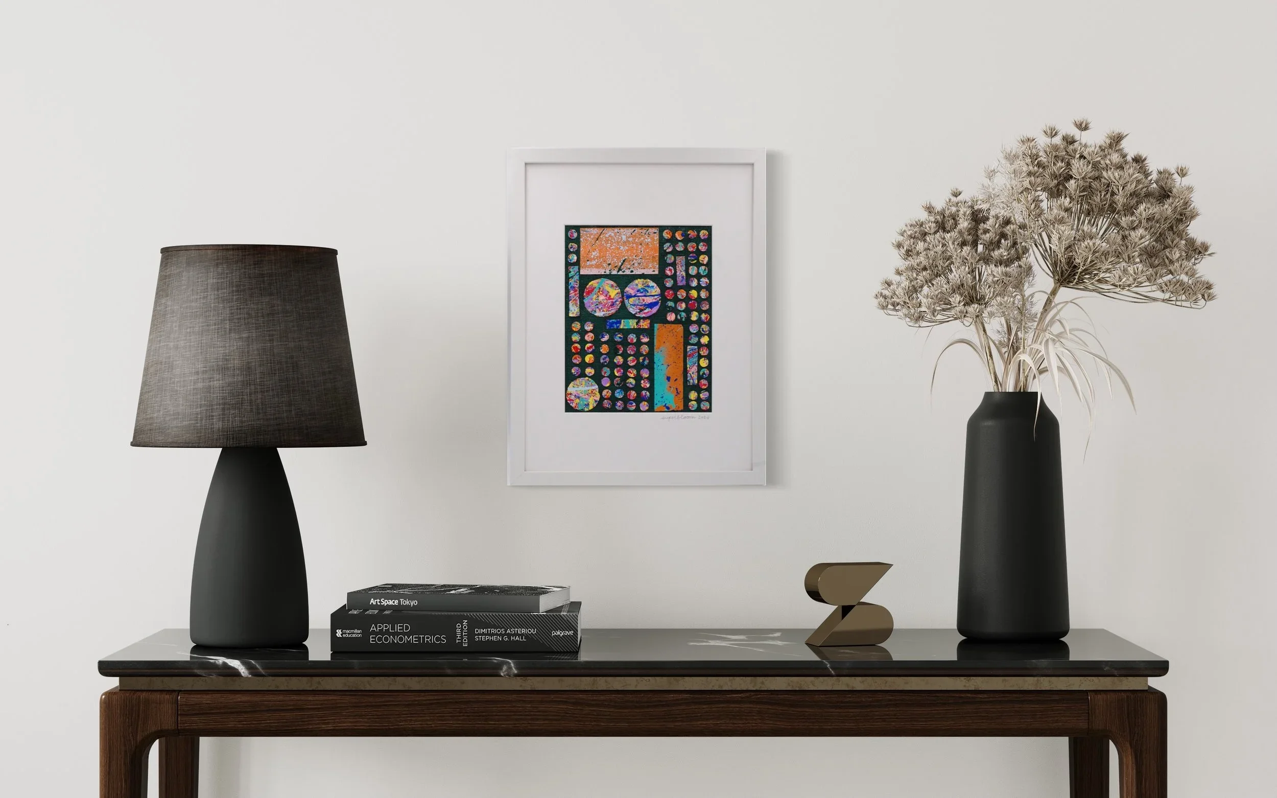 Repurpose No. 2 framed artwork styled on a console table in a modern neutral home interior with lamp, books, and vase.