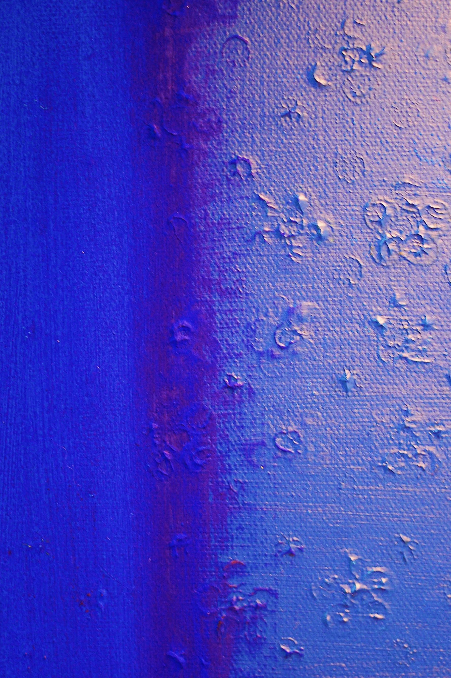 Close-up of layered blue acrylic and gouache revealing small five-petal flower impressions beneath the textured surface of Royal Loyal Blue by SUPERBLOOM
