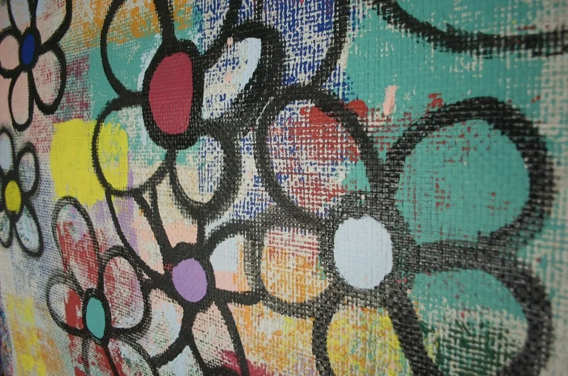 Close-up of Untamed Beauty wildflowers revealing paint texture, brush strokes, and woven linen surface