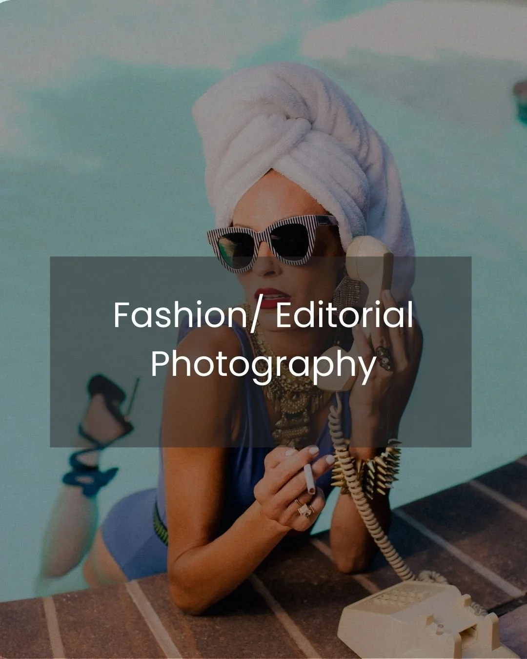 Commercial Photography- A woman wearing sunglasses and a white towel wrapped on her head, talking on a vintage rotary phone with a background resembling a pool or beach scene.