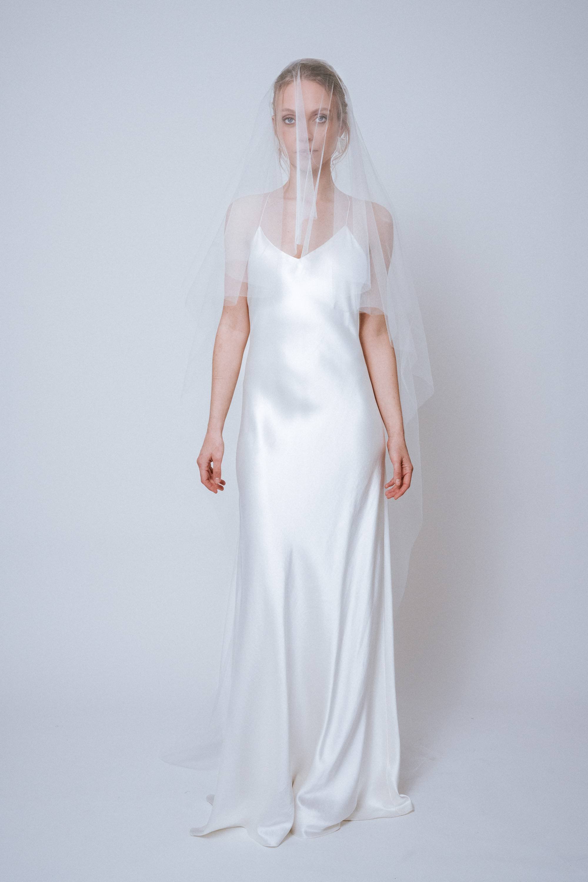 Front view of the Signature Veil with blusher layer covering the face, showing soft rounded silhouette