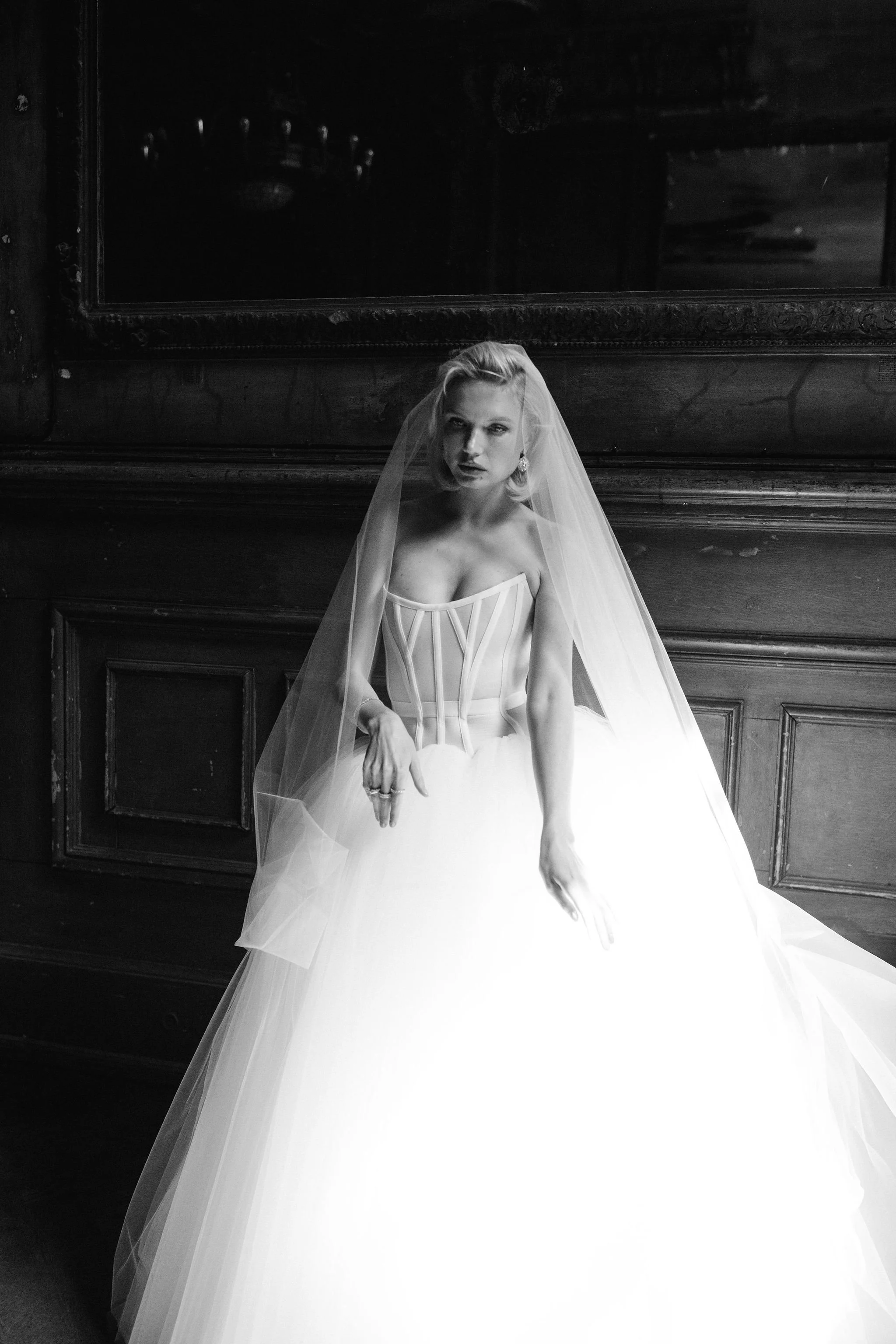 Editorial full-body view of a black and white bridal couture dress handcrafted in Berlin